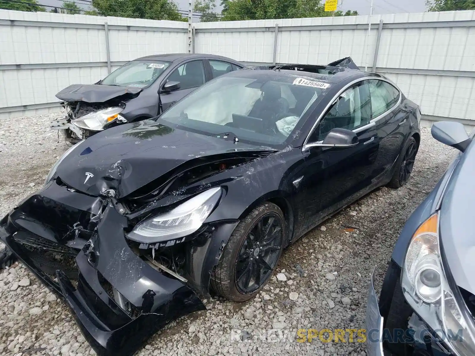 2 Photograph of a damaged car 5YJ3E1EB6KF384398 TESLA MODEL 3 2019