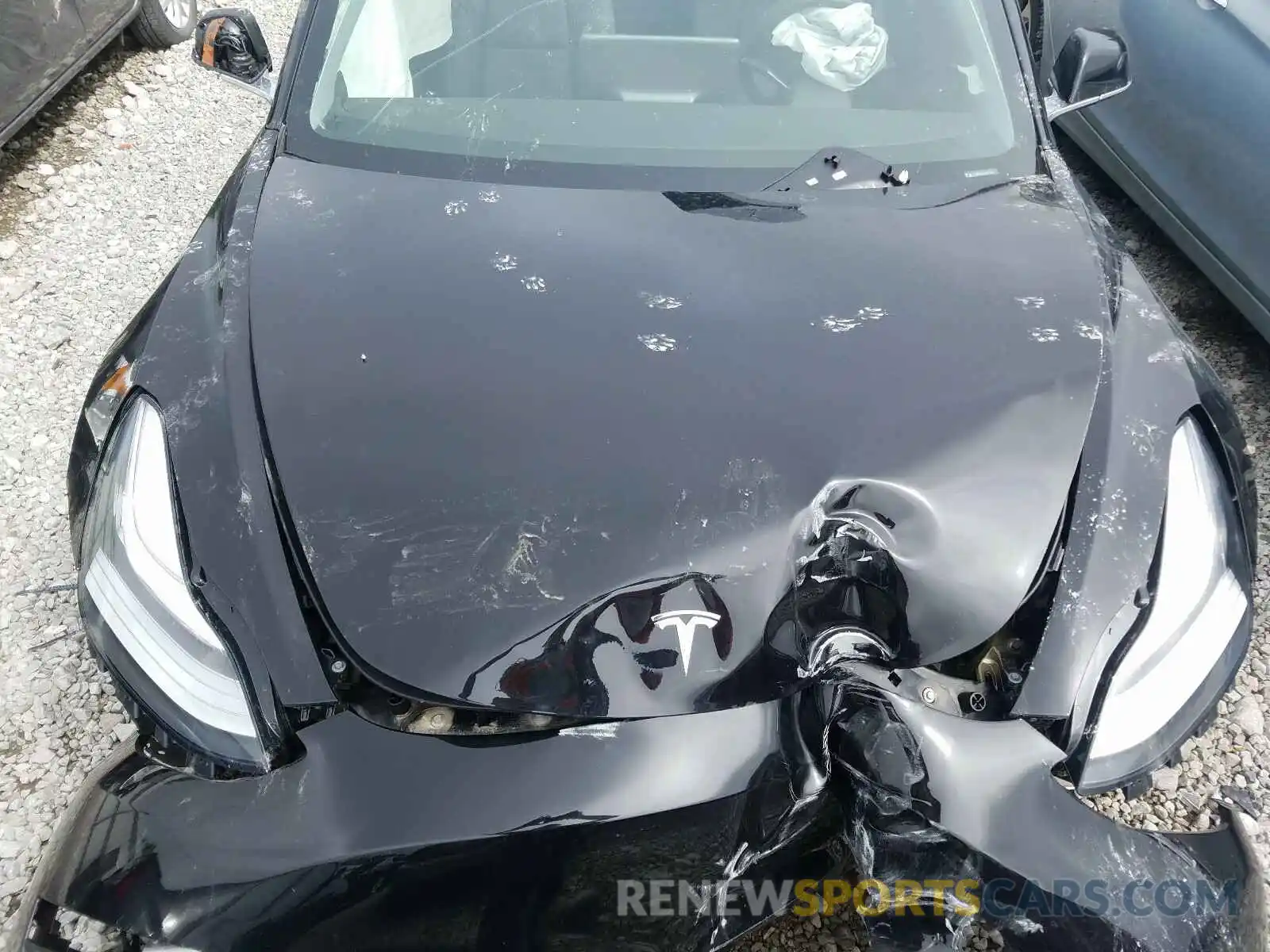 7 Photograph of a damaged car 5YJ3E1EB6KF384398 TESLA MODEL 3 2019