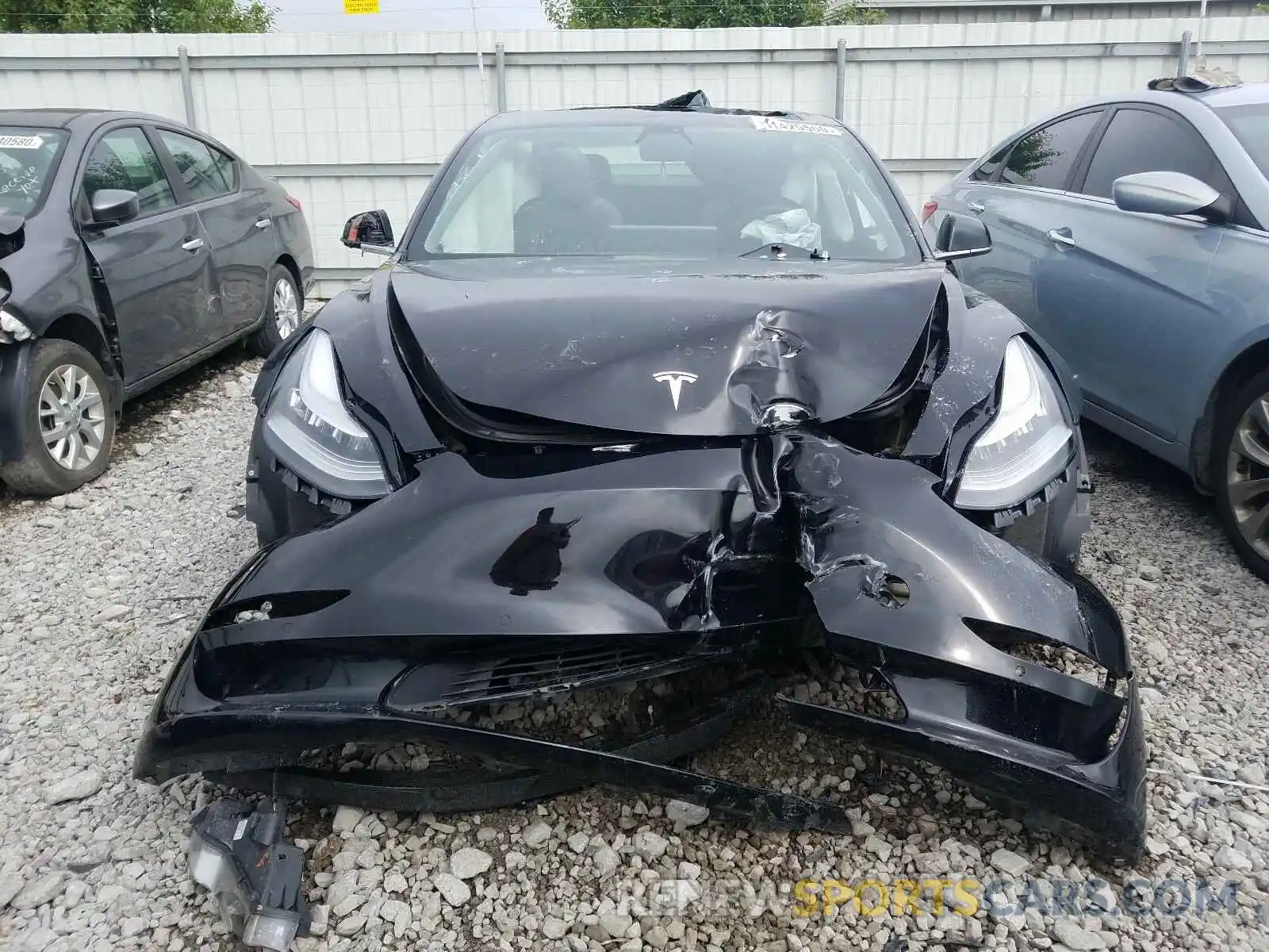 9 Photograph of a damaged car 5YJ3E1EB6KF384398 TESLA MODEL 3 2019