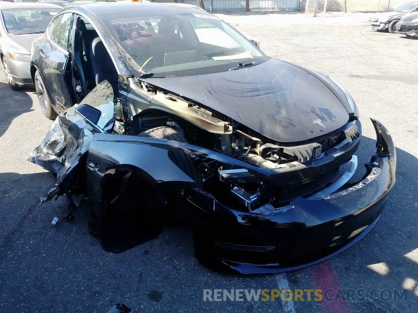 1 Photograph of a damaged car 5YJ3E1EB6KF385180 TESLA MODEL 3 2019