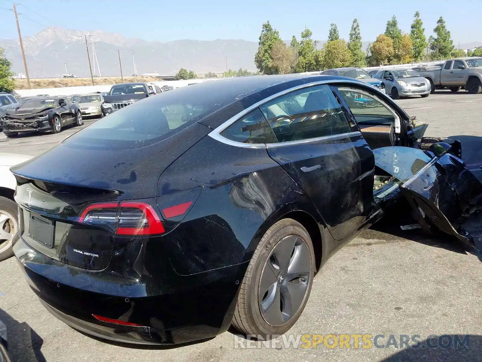 4 Photograph of a damaged car 5YJ3E1EB6KF385180 TESLA MODEL 3 2019