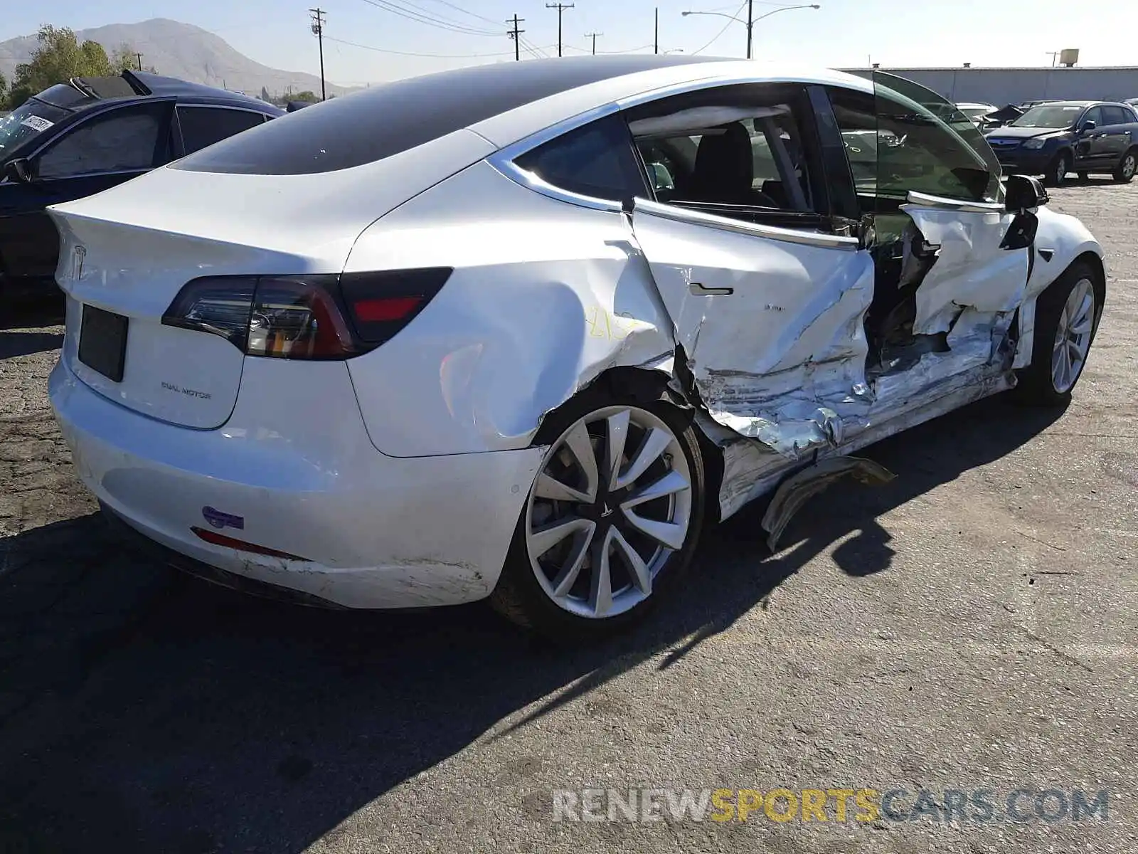 4 Photograph of a damaged car 5YJ3E1EB6KF390119 TESLA MODEL 3 2019