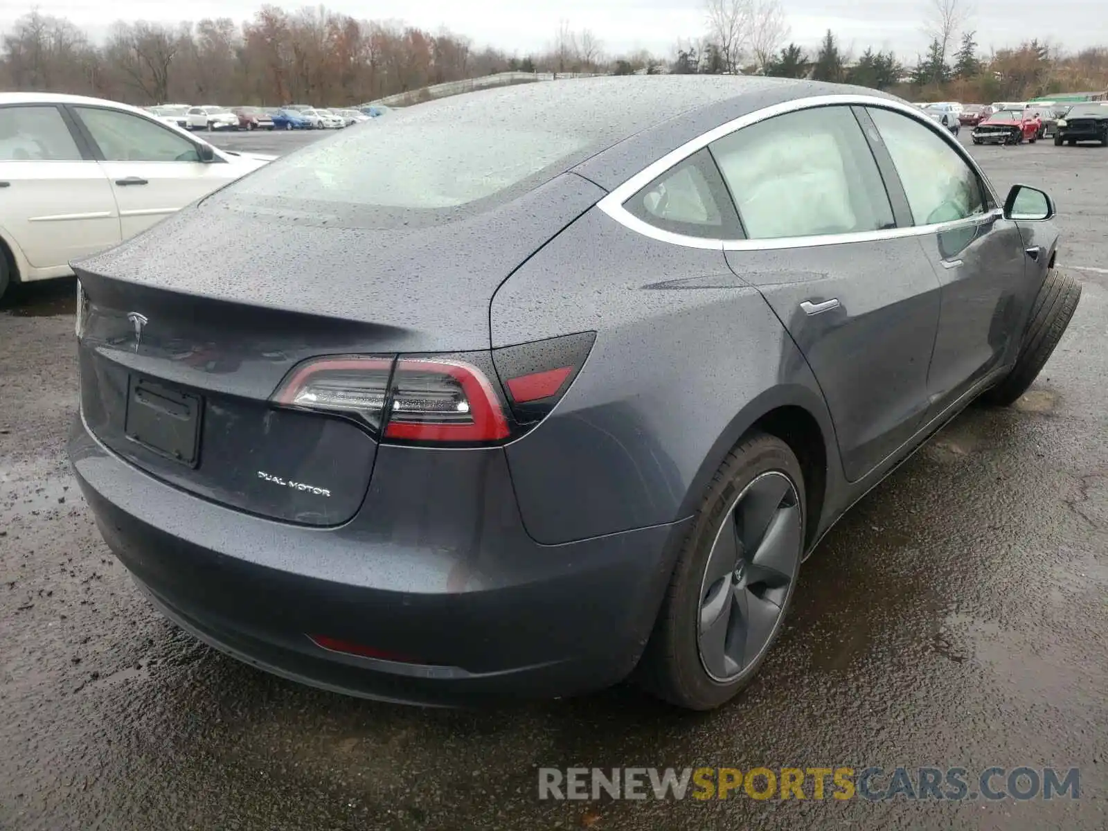 4 Photograph of a damaged car 5YJ3E1EB6KF390850 TESLA MODEL 3 2019