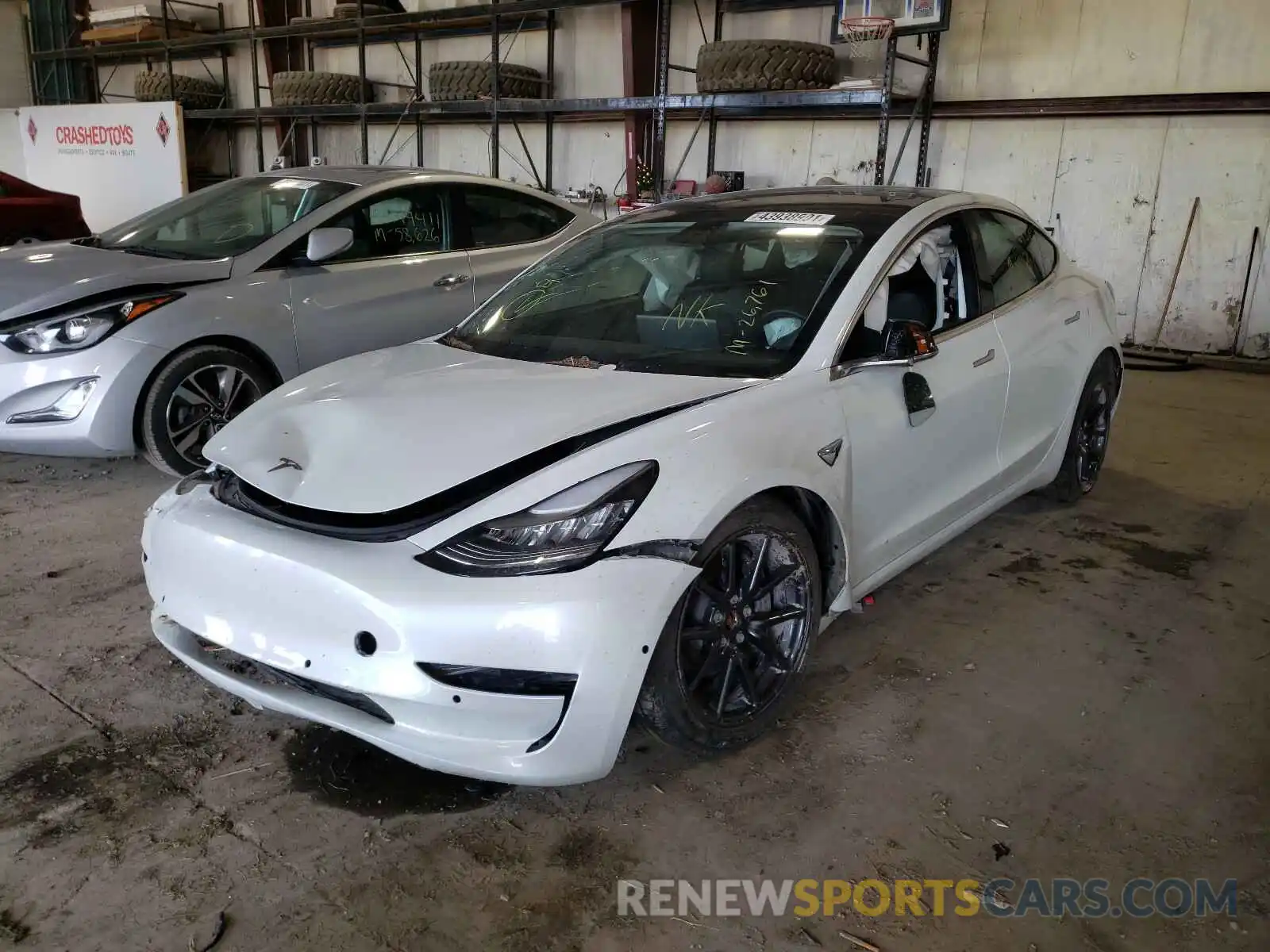 2 Photograph of a damaged car 5YJ3E1EB6KF433423 TESLA MODEL 3 2019