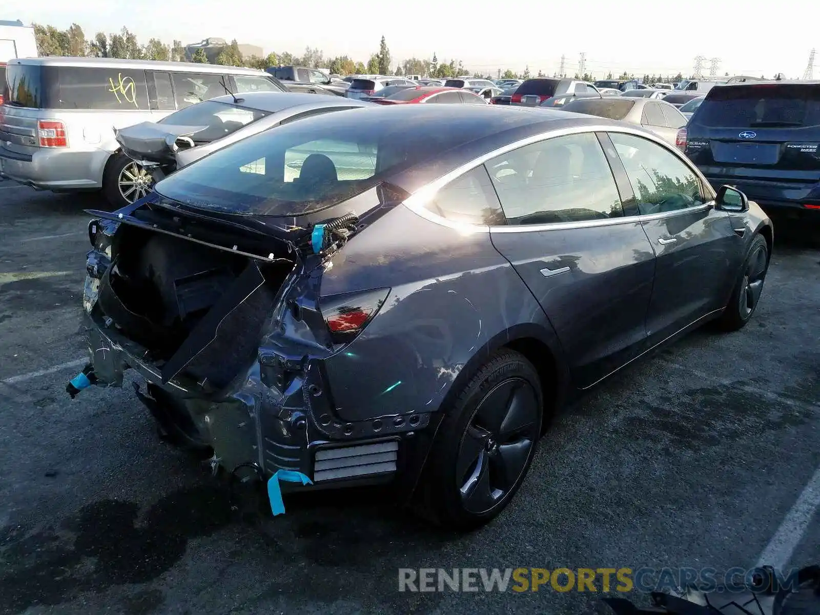 4 Photograph of a damaged car 5YJ3E1EB6KF453252 TESLA MODEL 3 2019