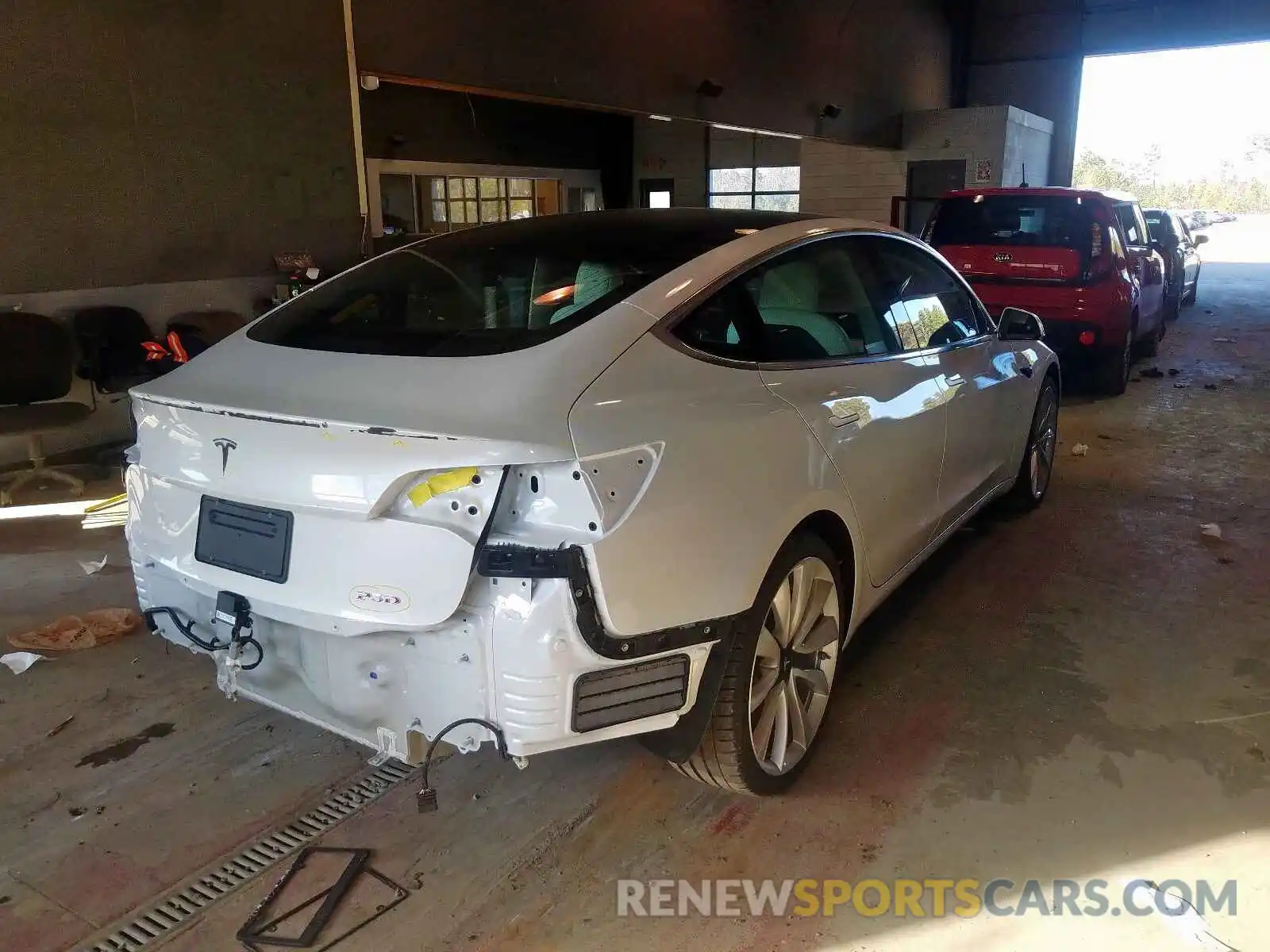 4 Photograph of a damaged car 5YJ3E1EB6KF487384 TESLA MODEL 3 2019