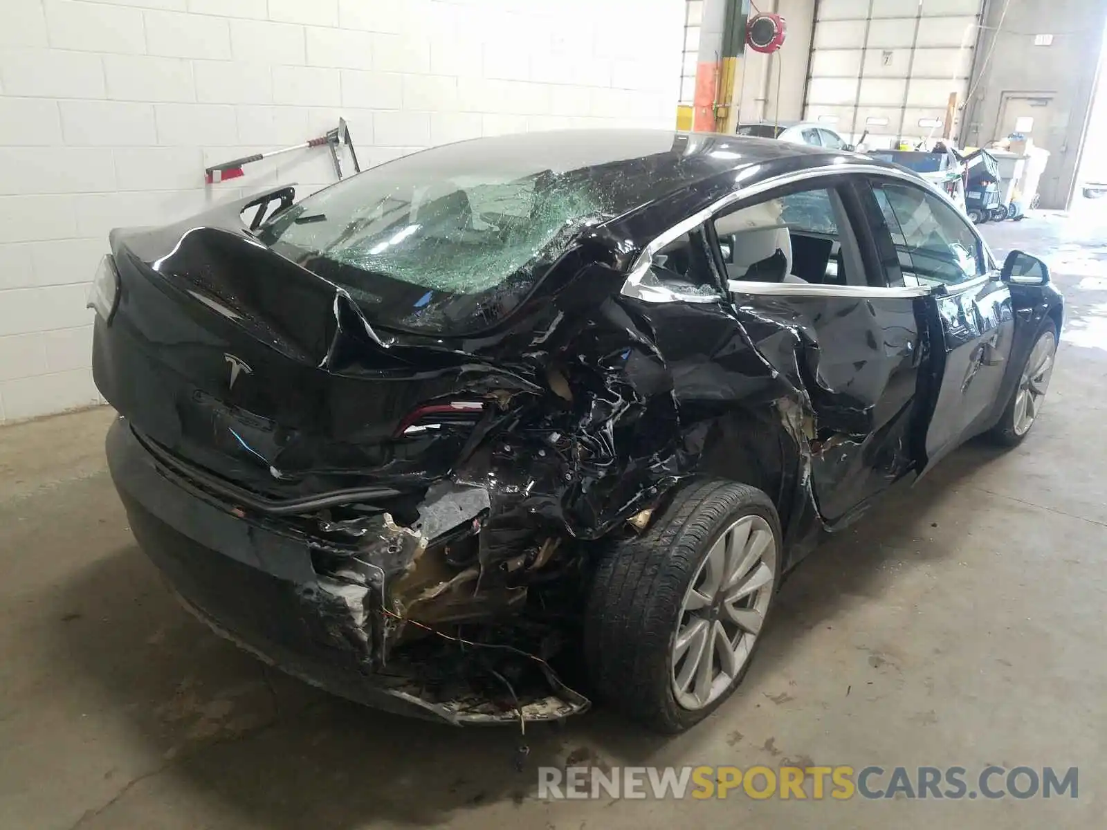 4 Photograph of a damaged car 5YJ3E1EB7KF195646 TESLA MODEL 3 2019