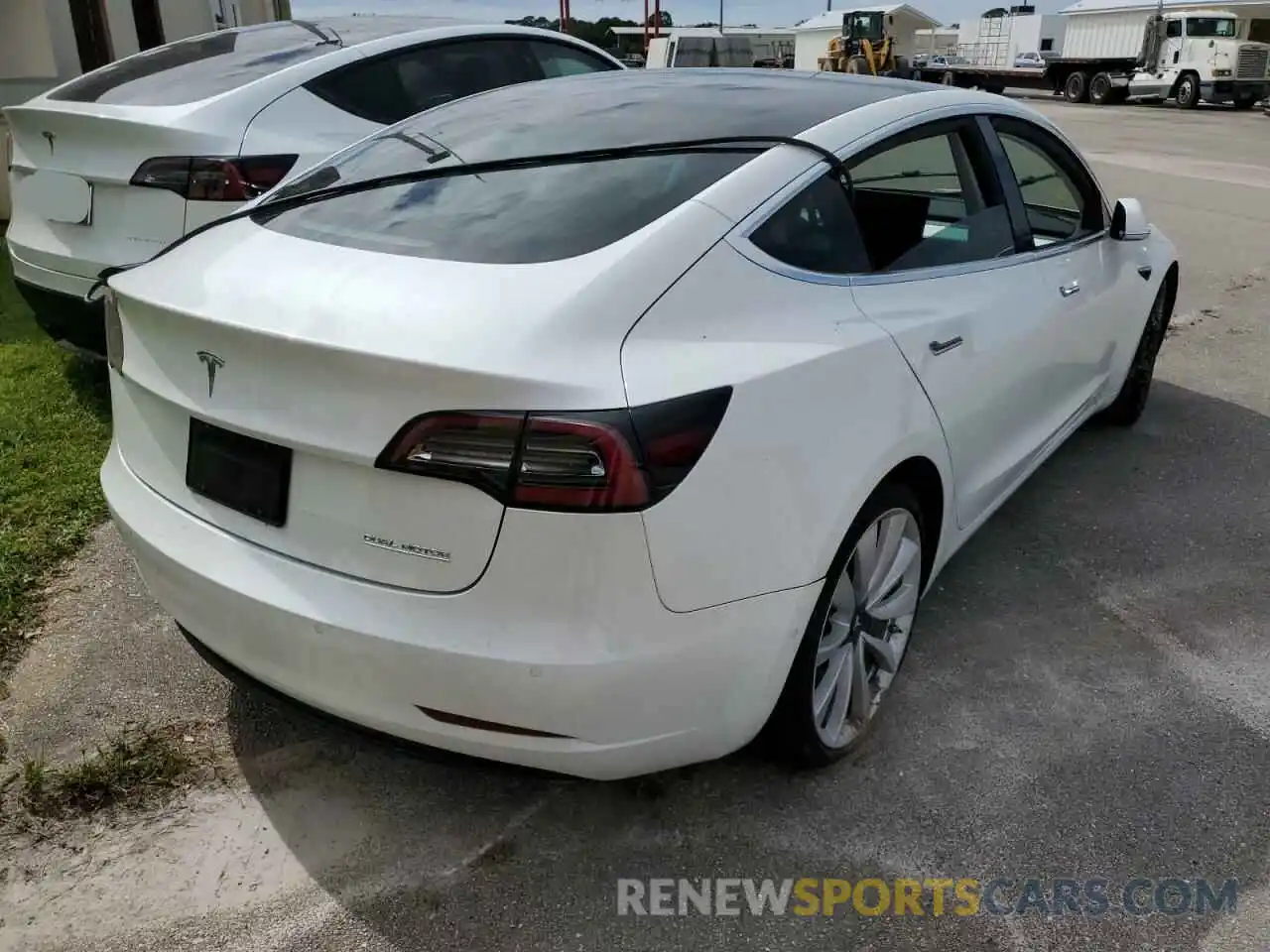 4 Photograph of a damaged car 5YJ3E1EB7KF214101 TESLA MODEL 3 2019