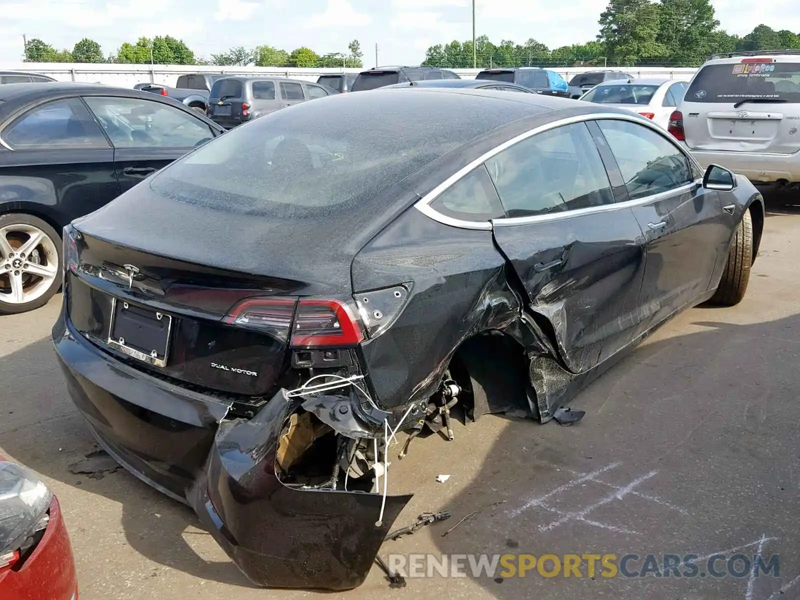 4 Photograph of a damaged car 5YJ3E1EB7KF384393 TESLA MODEL 3 2019