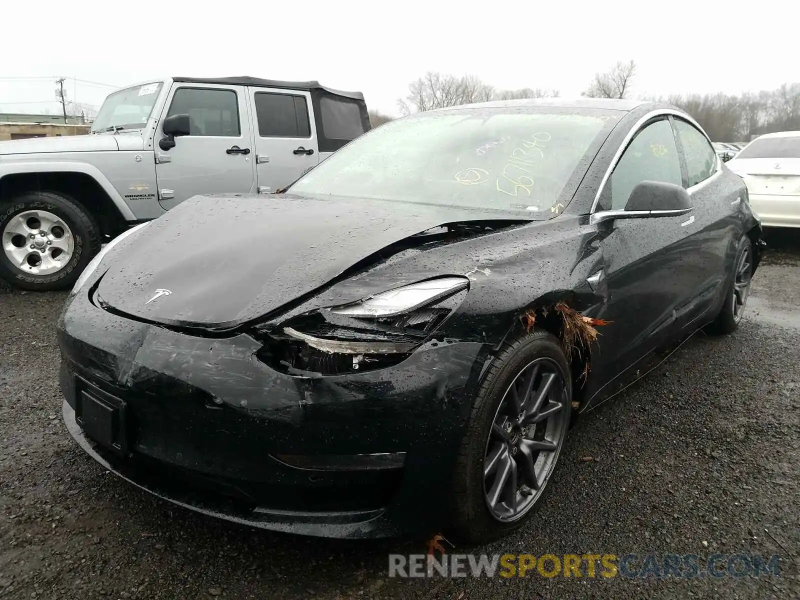 2 Photograph of a damaged car 5YJ3E1EB7KF385012 TESLA MODEL 3 2019