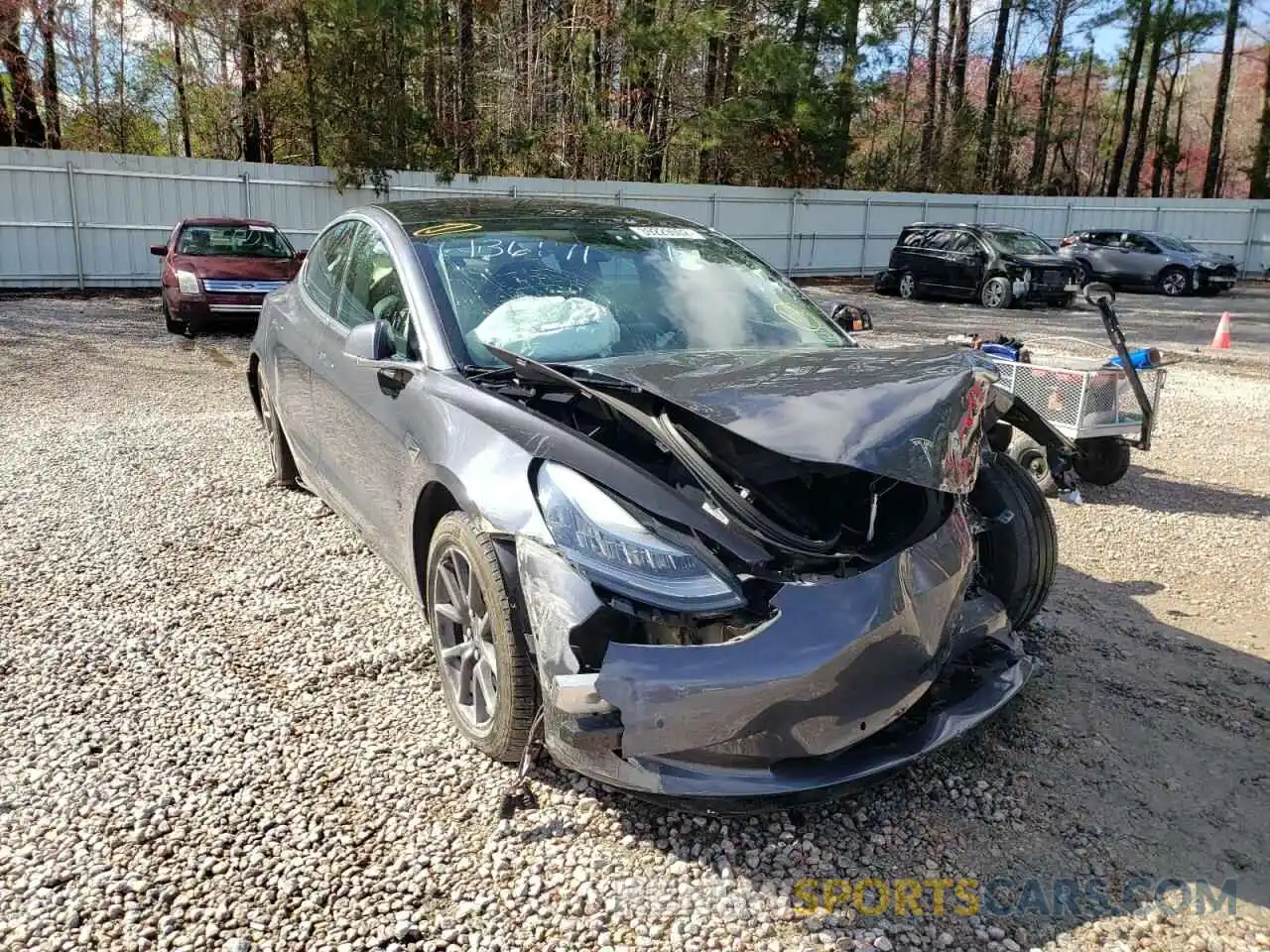 1 Photograph of a damaged car 5YJ3E1EB7KF386483 TESLA MODEL 3 2019