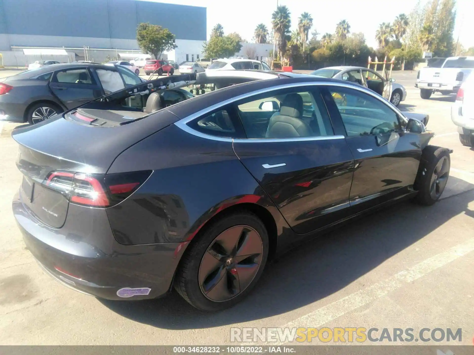 4 Photograph of a damaged car 5YJ3E1EB7KF386726 TESLA MODEL 3 2019