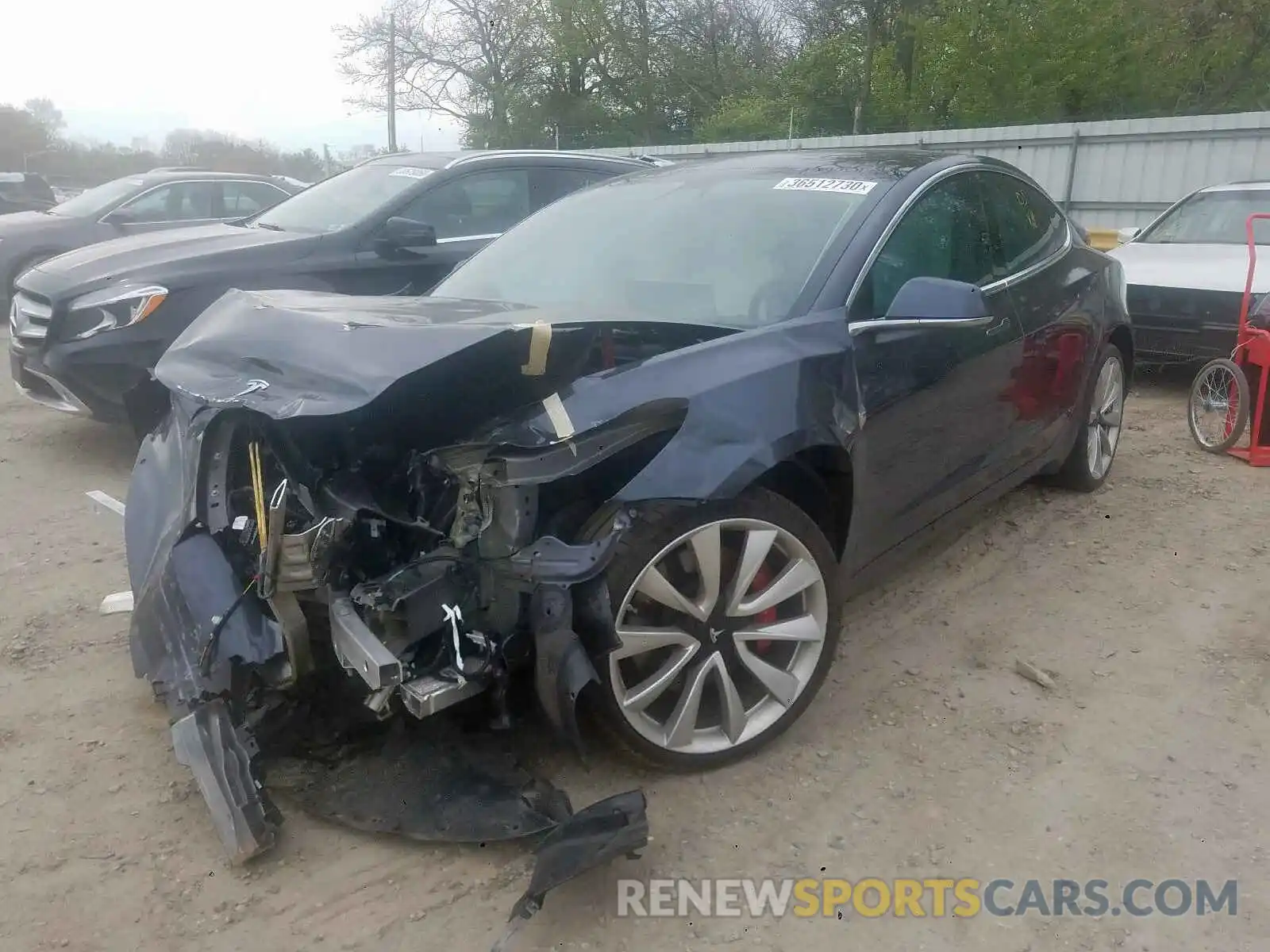 2 Photograph of a damaged car 5YJ3E1EB7KF393398 TESLA MODEL 3 2019