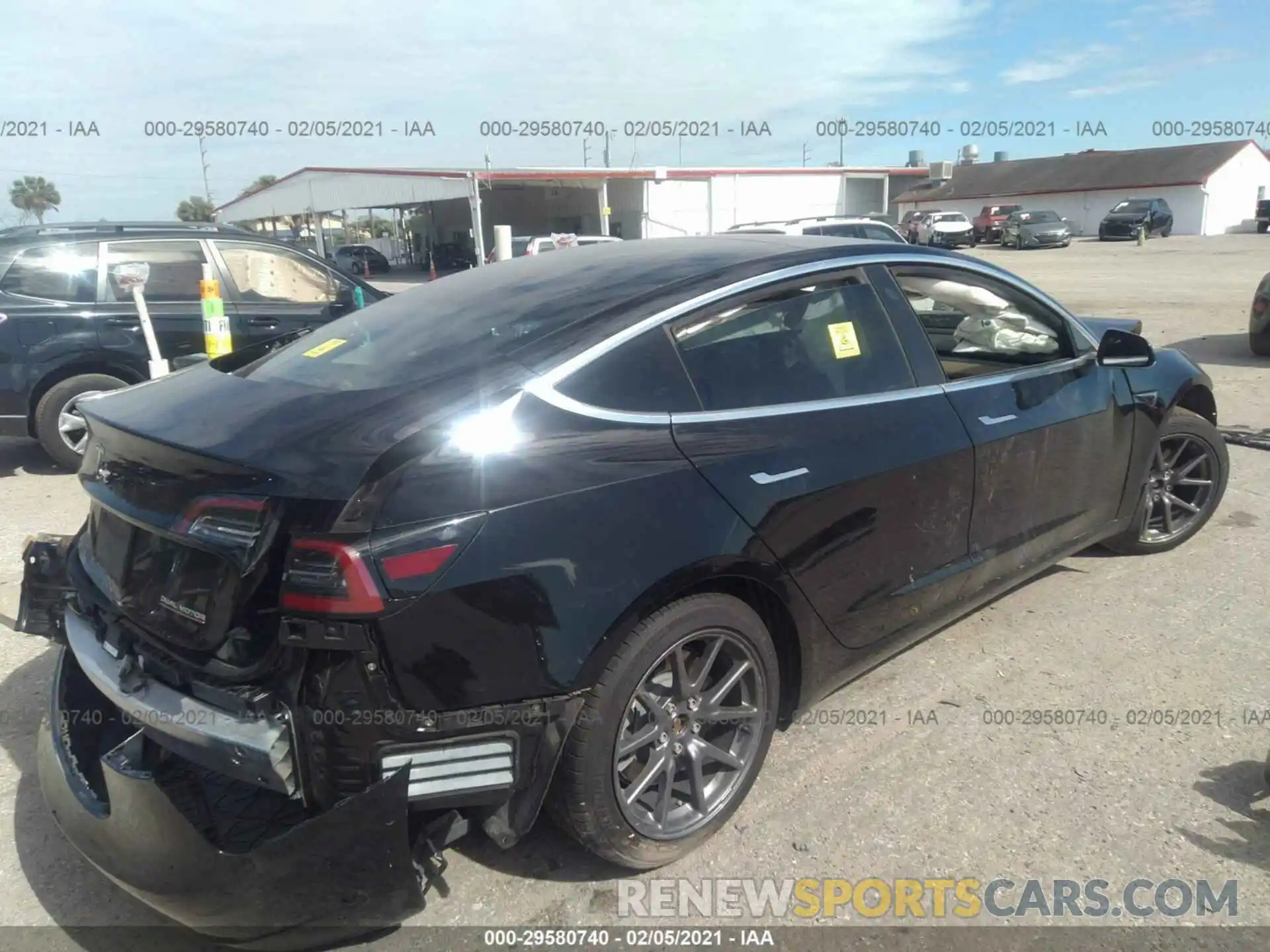 4 Photograph of a damaged car 5YJ3E1EB7KF432345 TESLA MODEL 3 2019