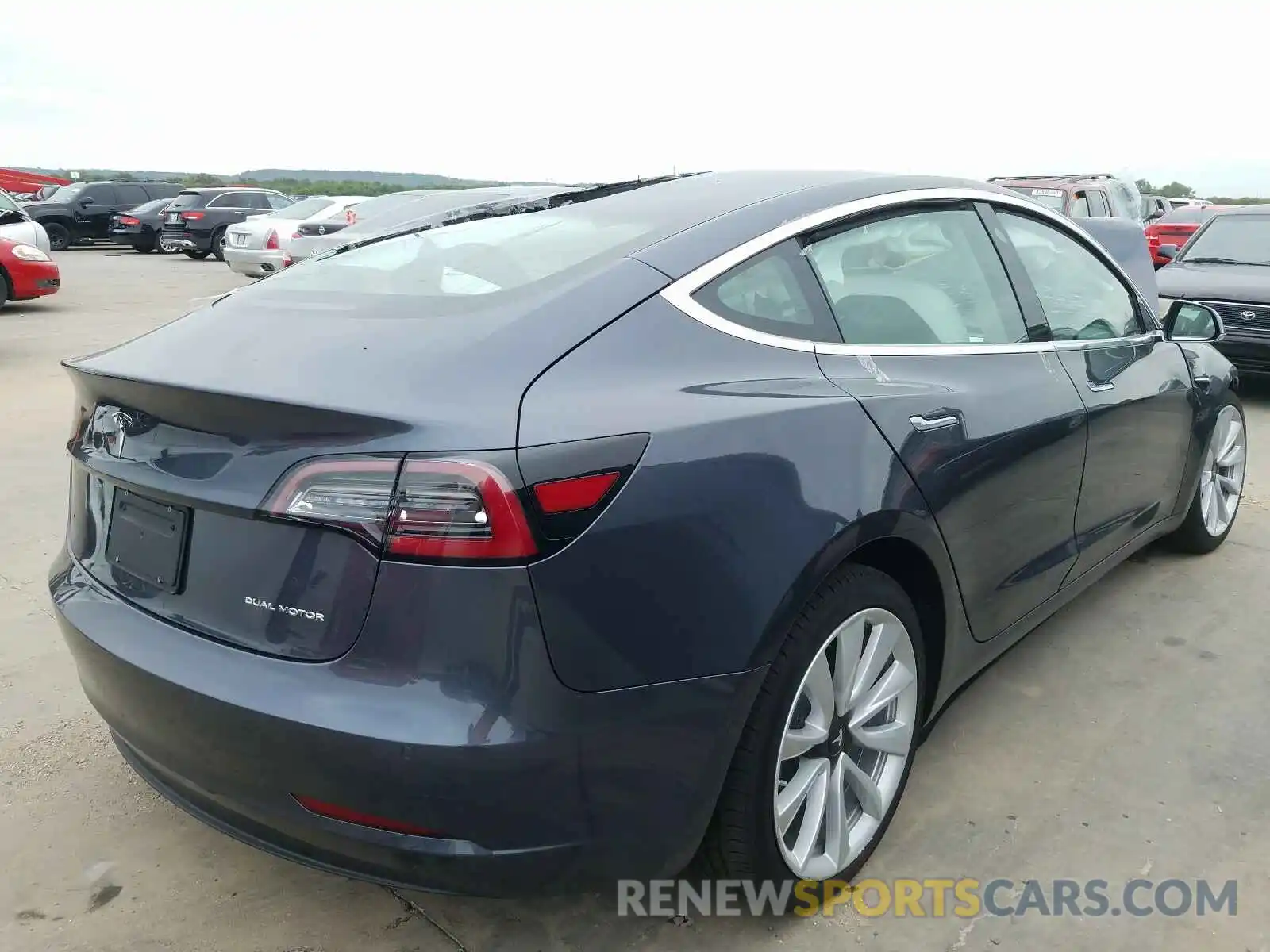 4 Photograph of a damaged car 5YJ3E1EB7KF450778 TESLA MODEL 3 2019