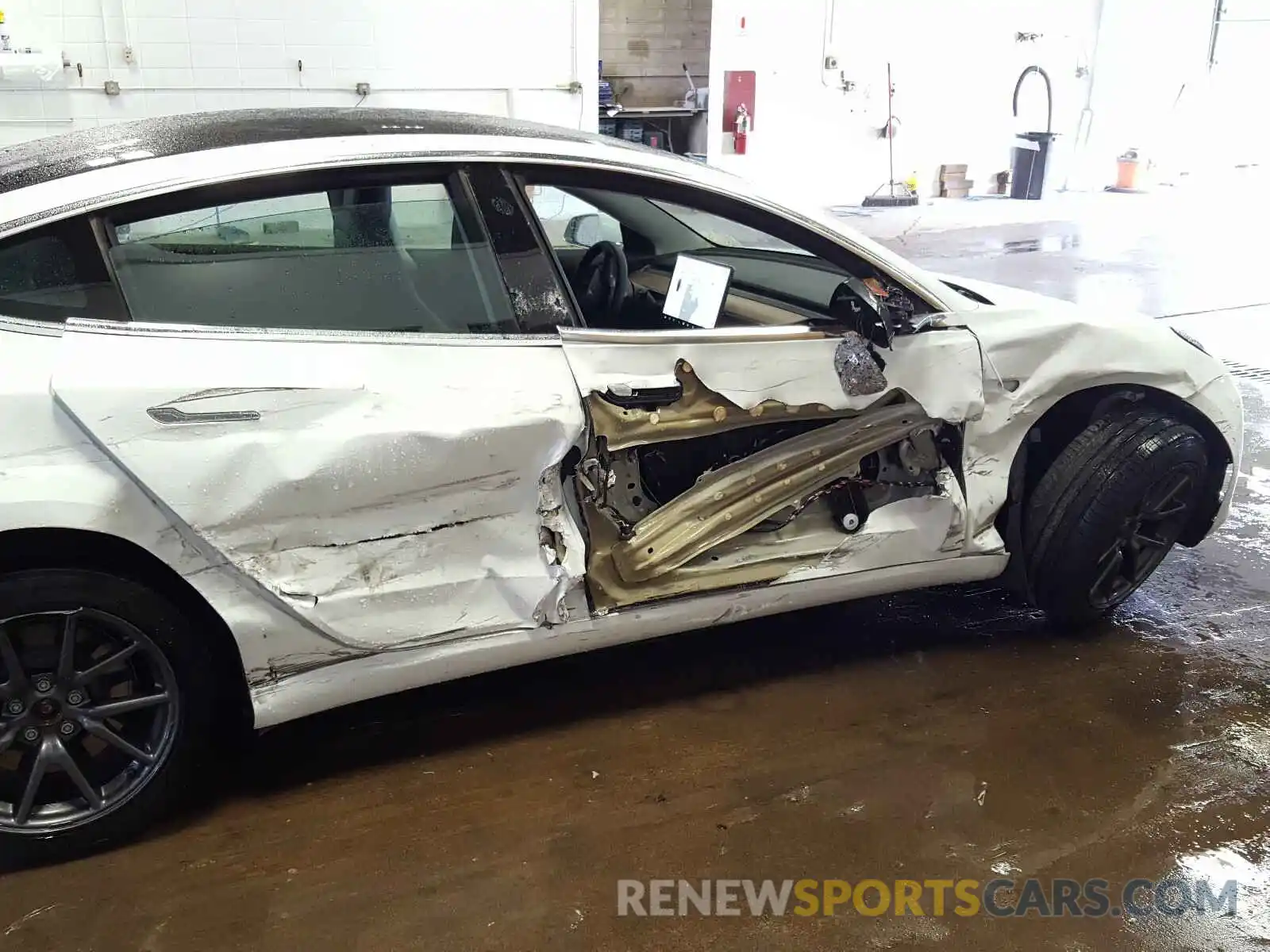 9 Photograph of a damaged car 5YJ3E1EB7KF451896 TESLA MODEL 3 2019