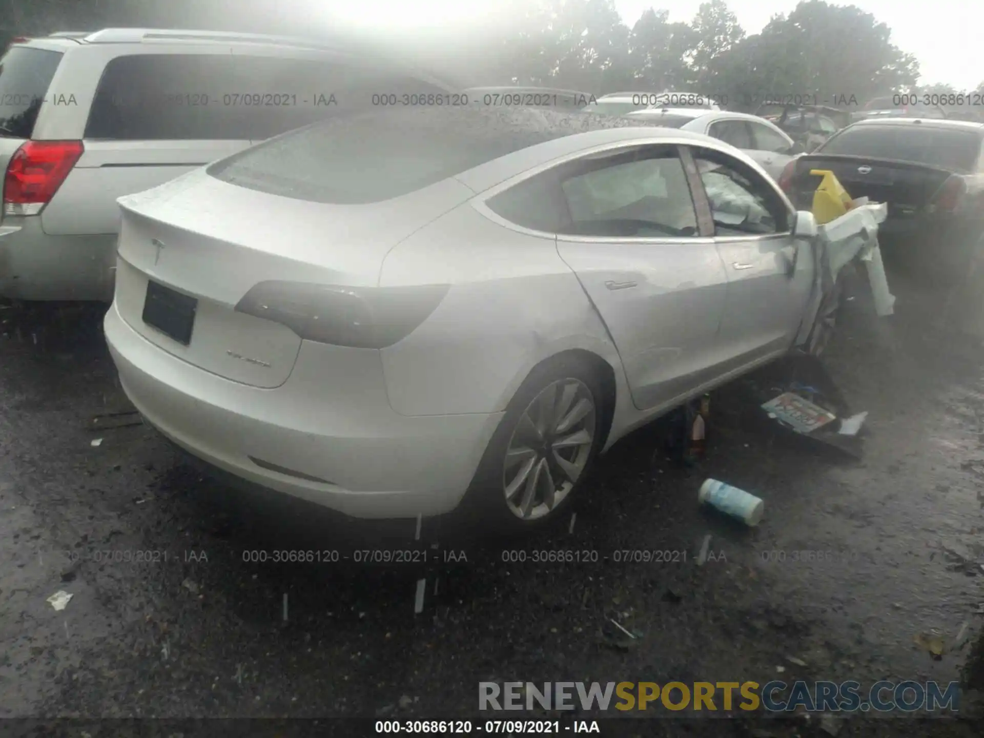 4 Photograph of a damaged car 5YJ3E1EB7KF454216 TESLA MODEL 3 2019