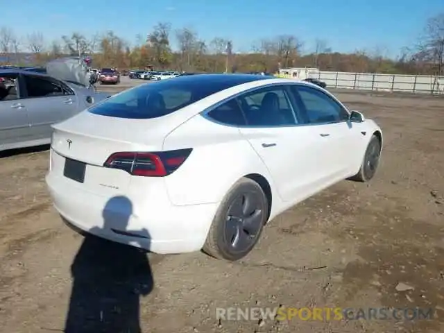 4 Photograph of a damaged car 5YJ3E1EB7KF493467 TESLA MODEL 3 2019