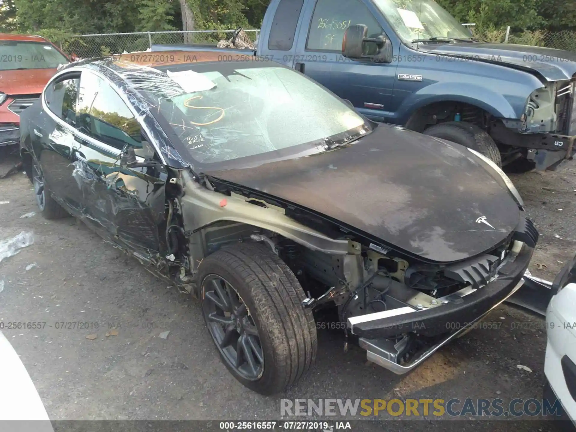 1 Photograph of a damaged car 5YJ3E1EB8KF197115 TESLA MODEL 3 2019