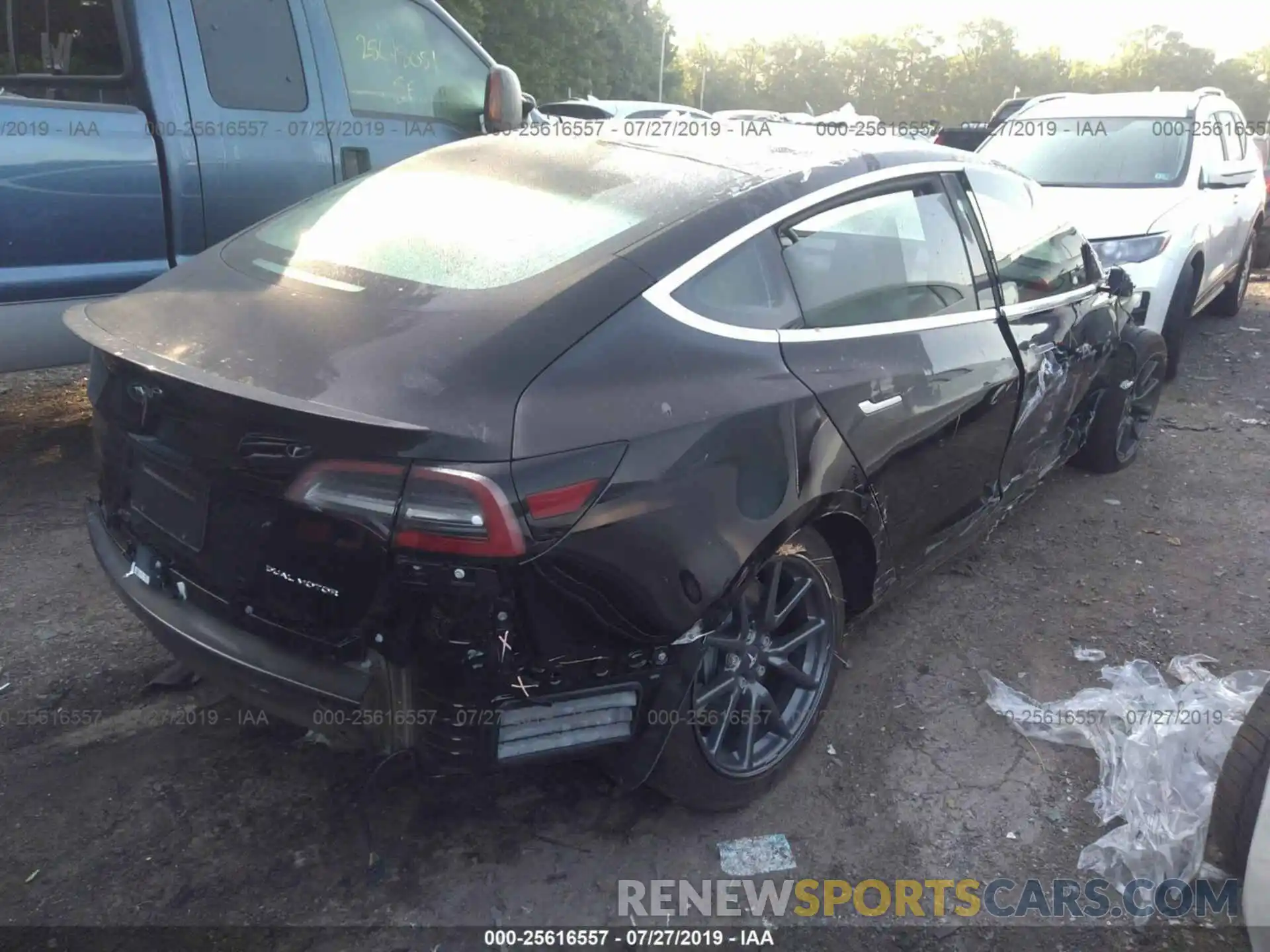 4 Photograph of a damaged car 5YJ3E1EB8KF197115 TESLA MODEL 3 2019