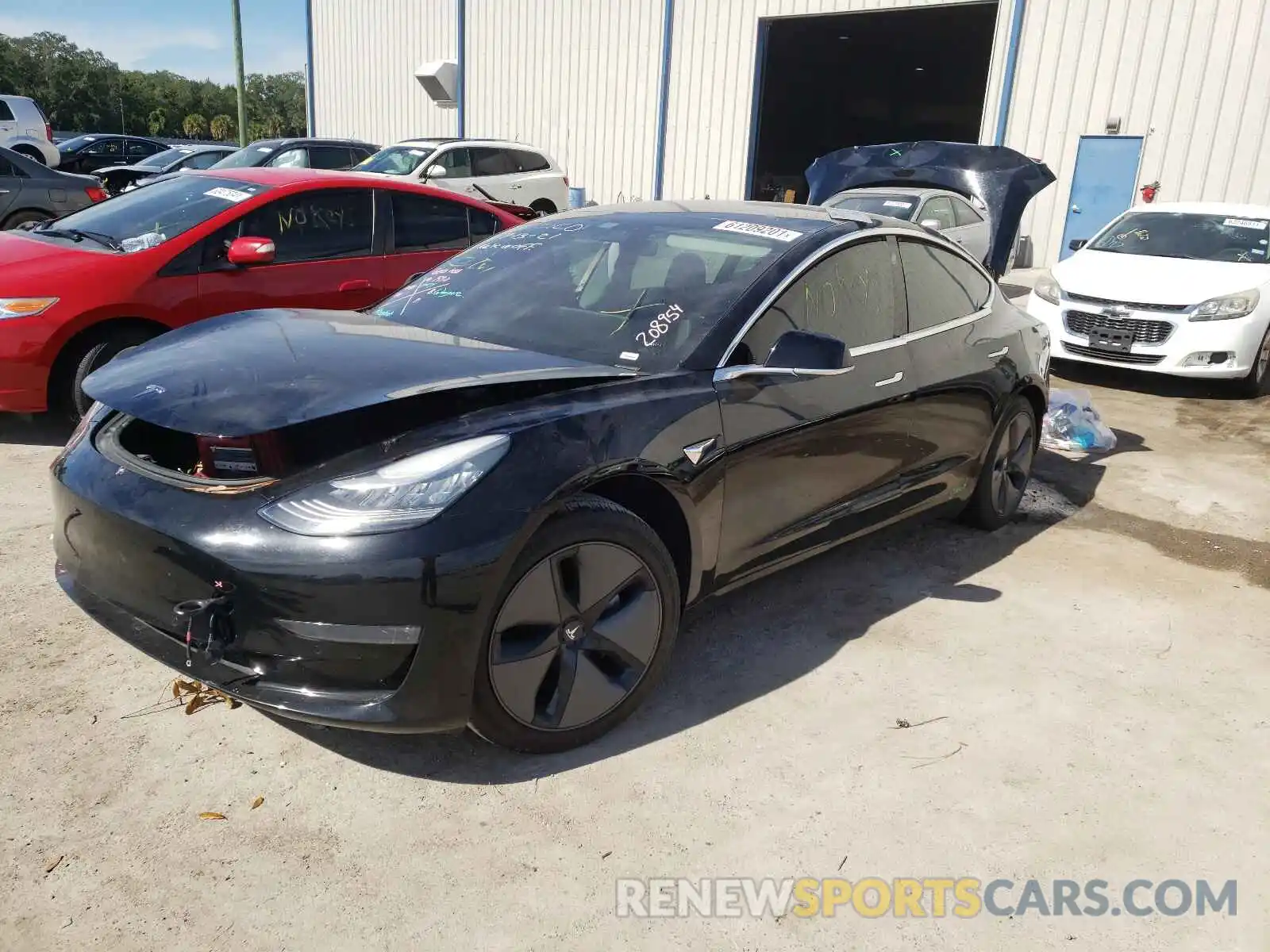 2 Photograph of a damaged car 5YJ3E1EB8KF208954 TESLA MODEL 3 2019