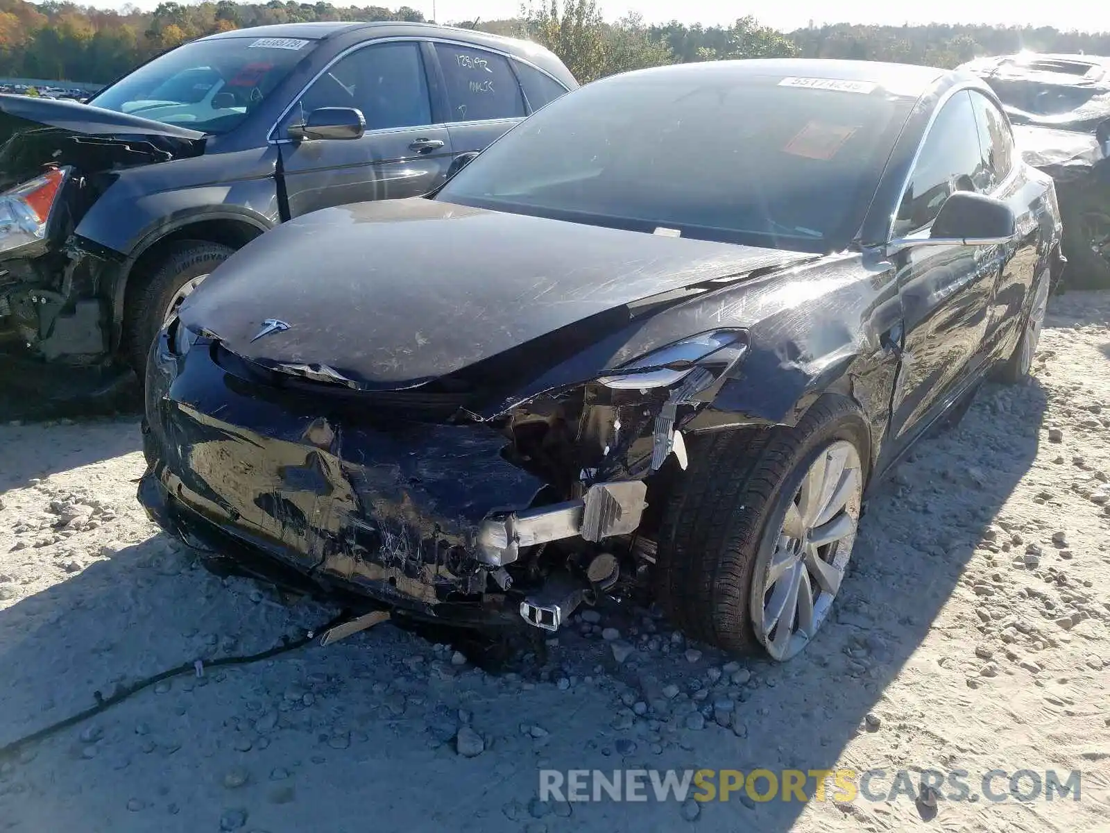 2 Photograph of a damaged car 5YJ3E1EB8KF388615 TESLA MODEL 3 2019