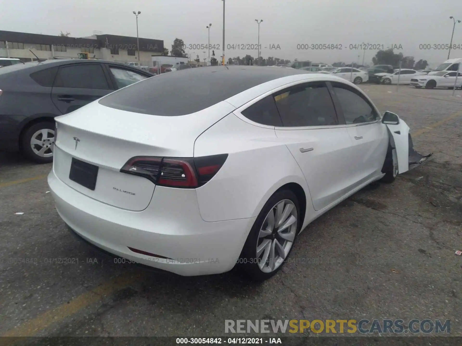 4 Photograph of a damaged car 5YJ3E1EB8KF421824 TESLA MODEL 3 2019