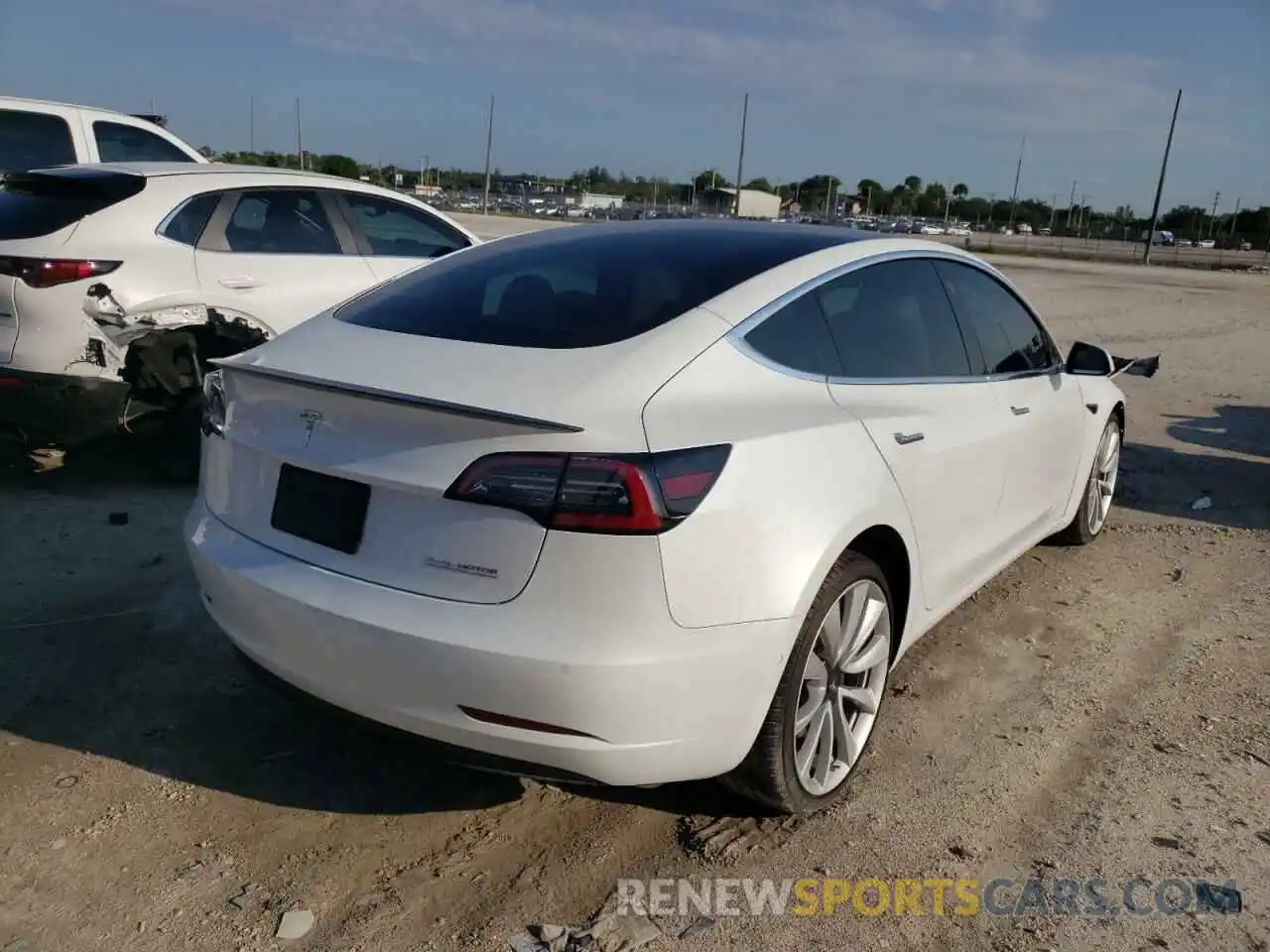 4 Photograph of a damaged car 5YJ3E1EB8KF487418 TESLA MODEL 3 2019