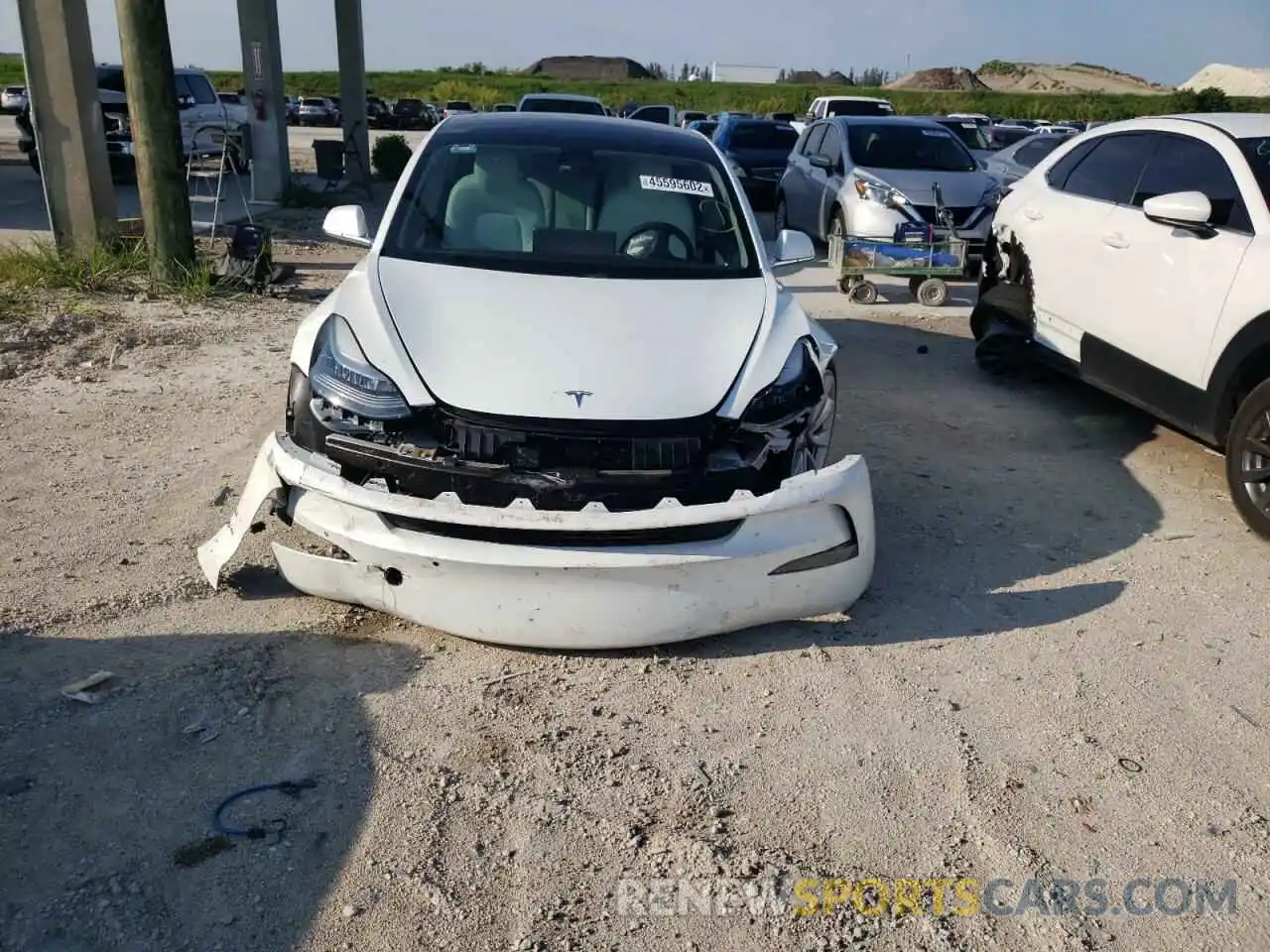 9 Photograph of a damaged car 5YJ3E1EB8KF487418 TESLA MODEL 3 2019