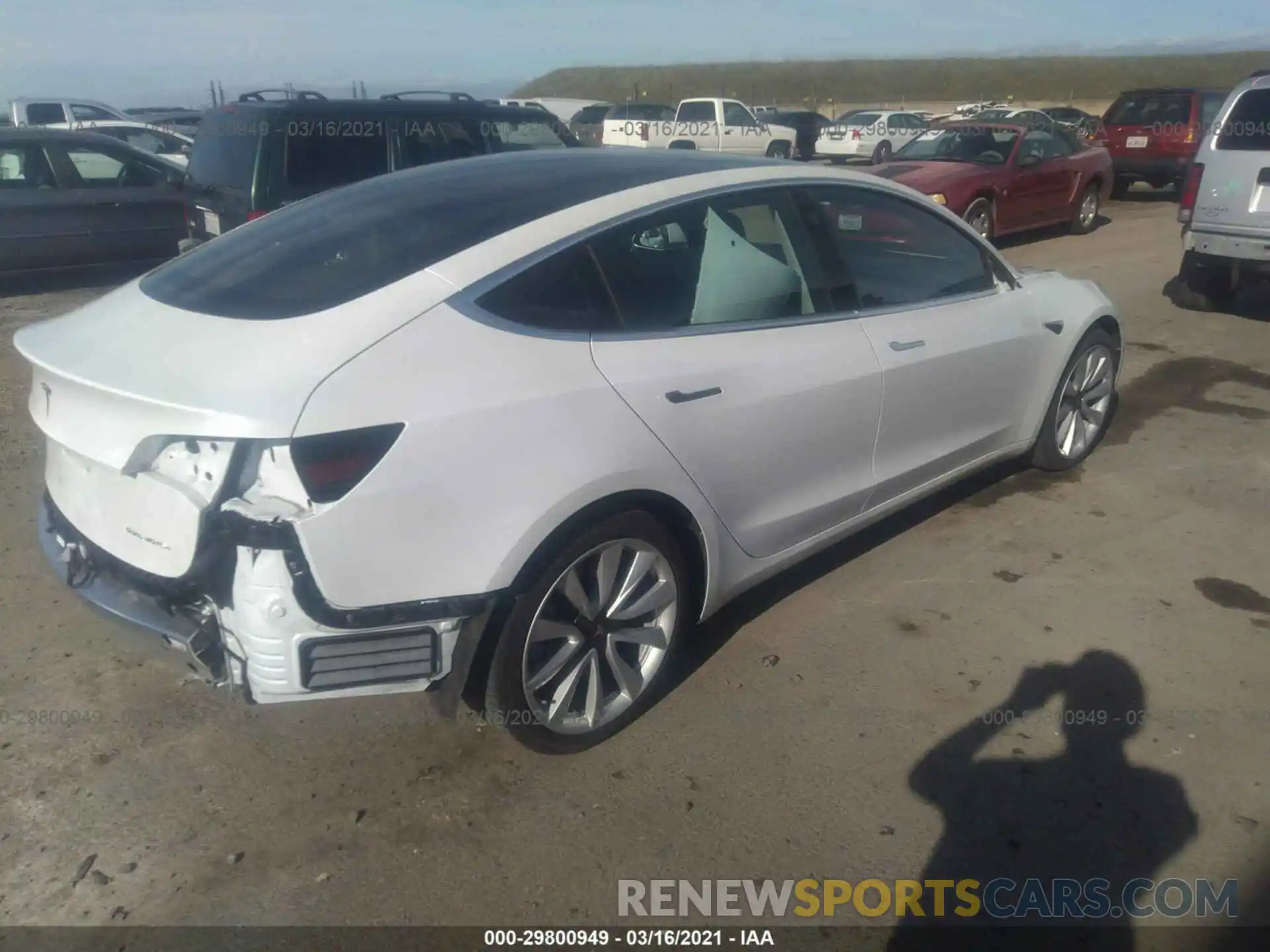 4 Photograph of a damaged car 5YJ3E1EB8KF512818 TESLA MODEL 3 2019