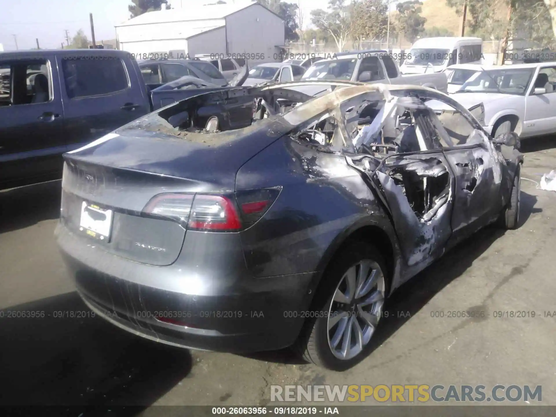 4 Photograph of a damaged car 5YJ3E1EB9KF205710 TESLA MODEL 3 2019