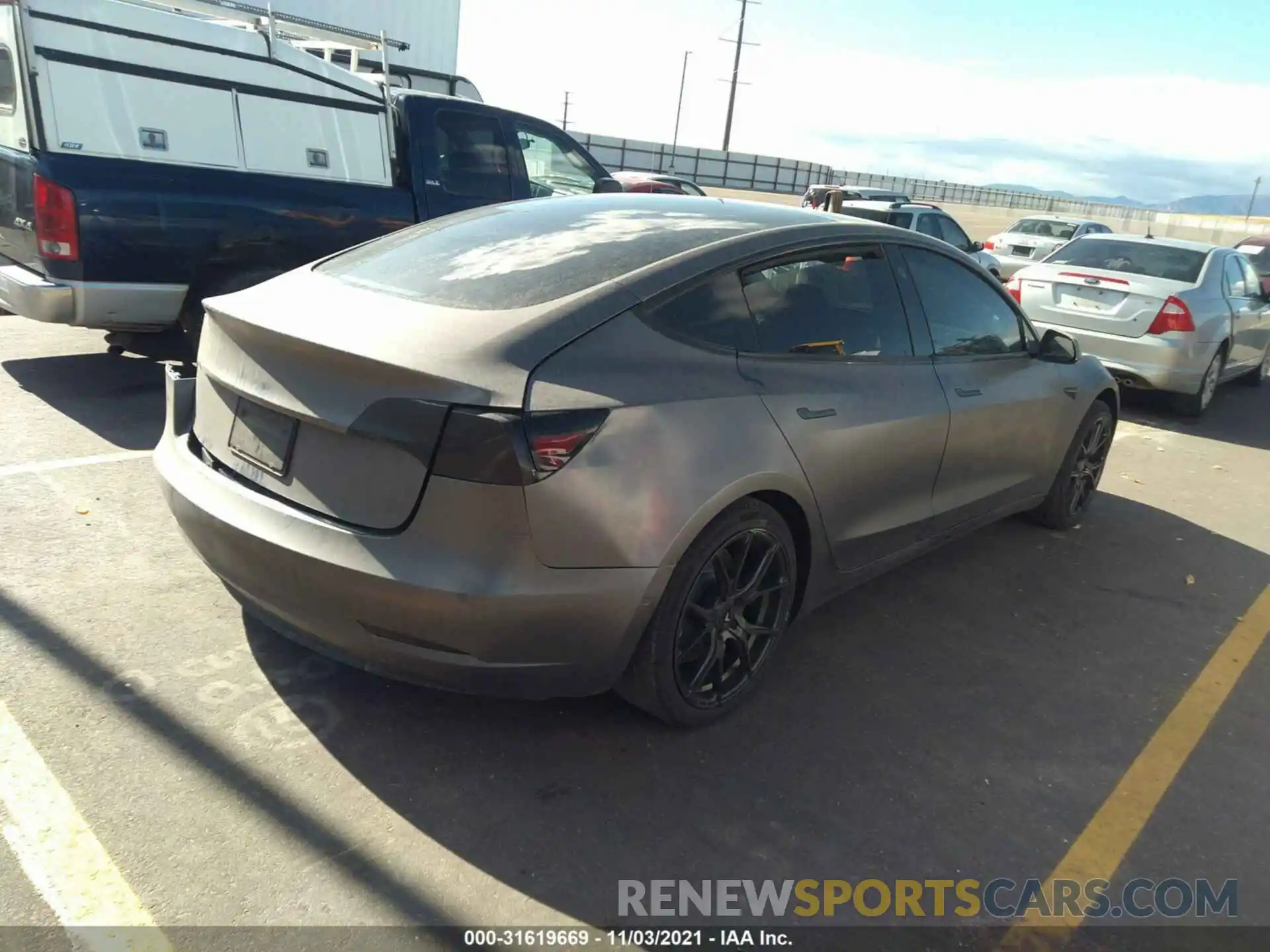 4 Photograph of a damaged car 5YJ3E1EB9KF205934 TESLA MODEL 3 2019