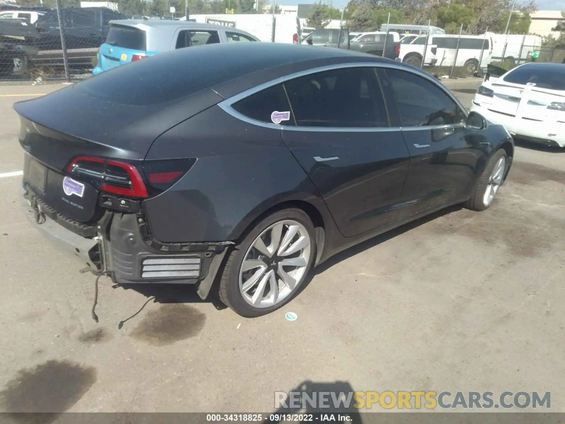 4 Photograph of a damaged car 5YJ3E1EB9KF209823 TESLA MODEL 3 2019