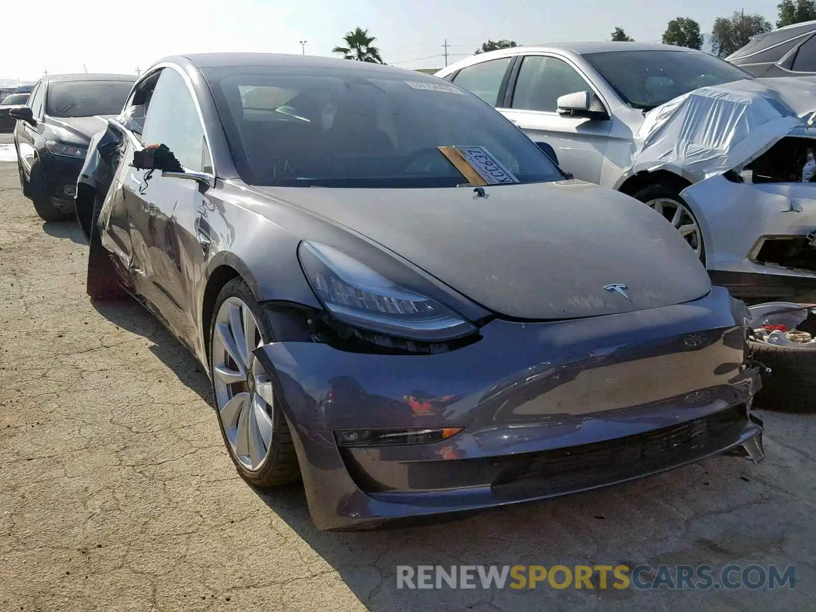 1 Photograph of a damaged car 5YJ3E1EB9KF213998 TESLA MODEL 3 2019