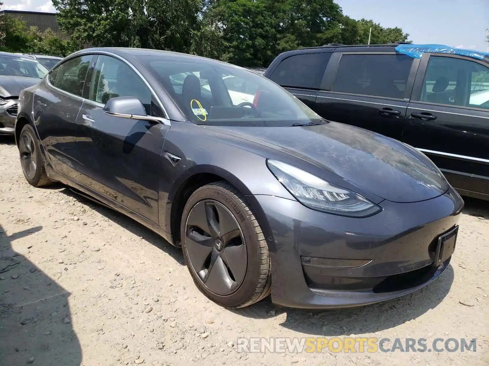 1 Photograph of a damaged car 5YJ3E1EB9KF386095 TESLA MODEL 3 2019