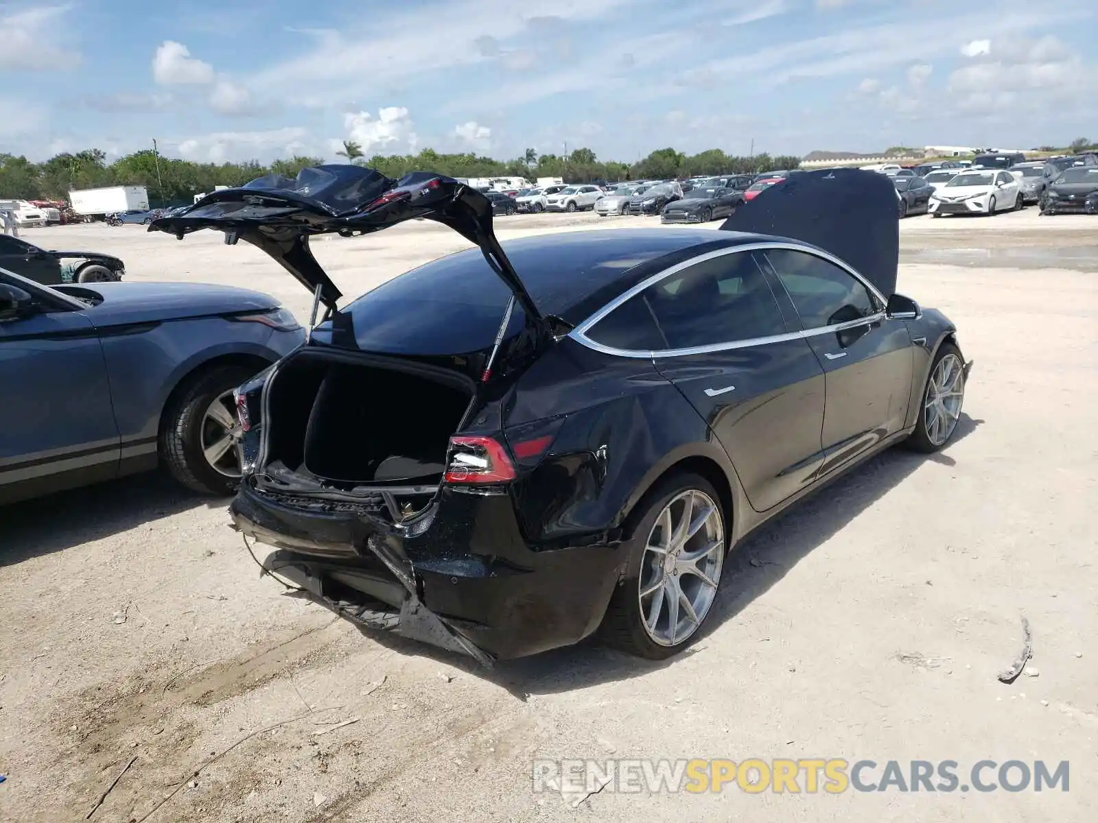 4 Photograph of a damaged car 5YJ3E1EB9KF451494 TESLA MODEL 3 2019