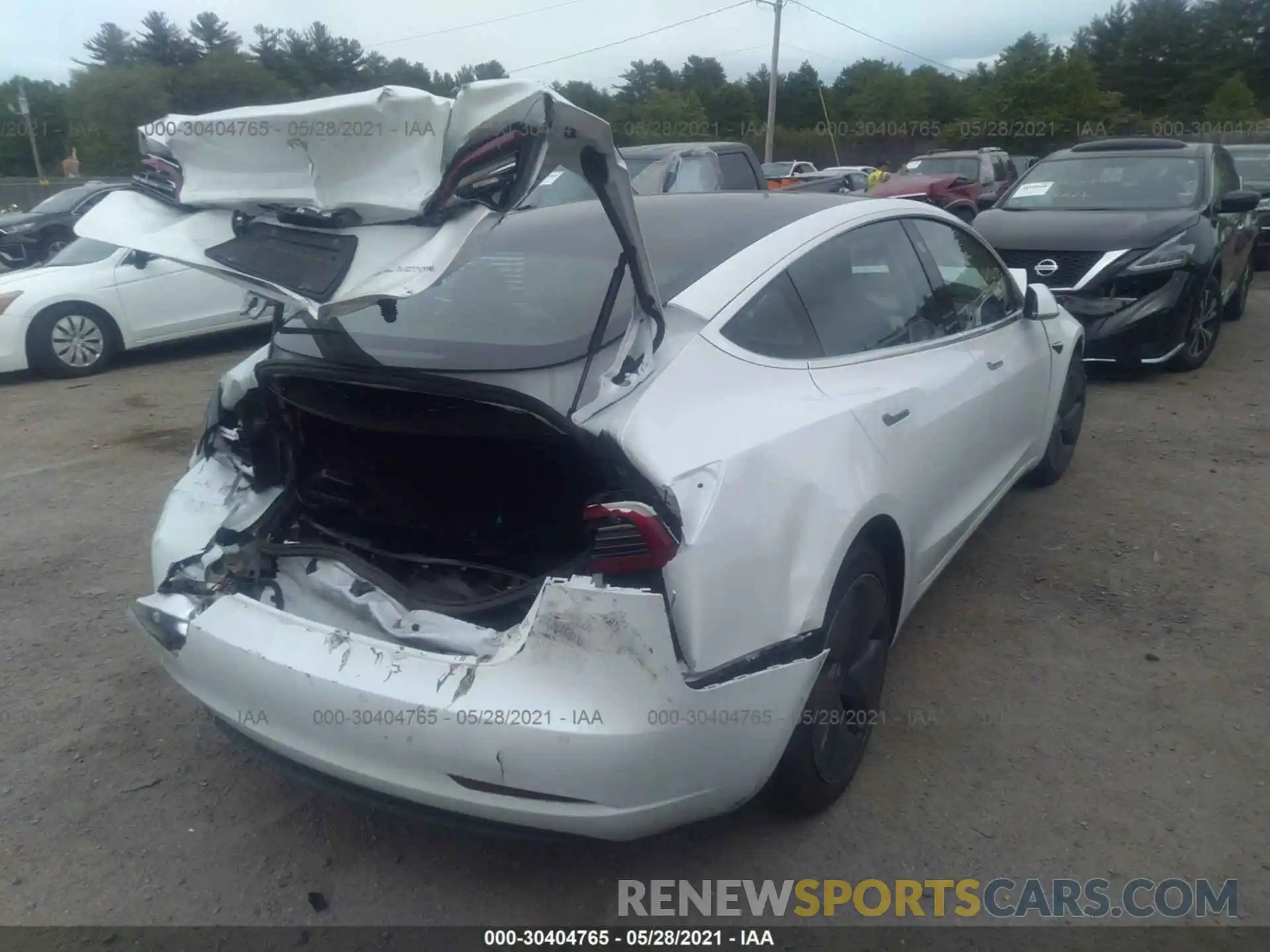 4 Photograph of a damaged car 5YJ3E1EB9KF469851 TESLA MODEL 3 2019