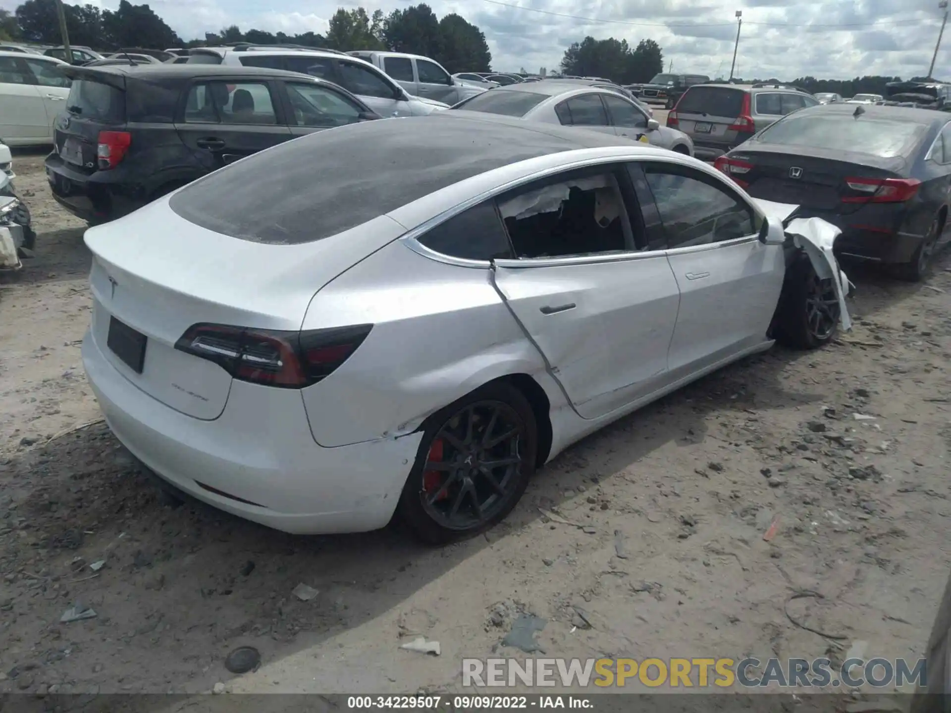 4 Photograph of a damaged car 5YJ3E1EB9KF493986 TESLA MODEL 3 2019