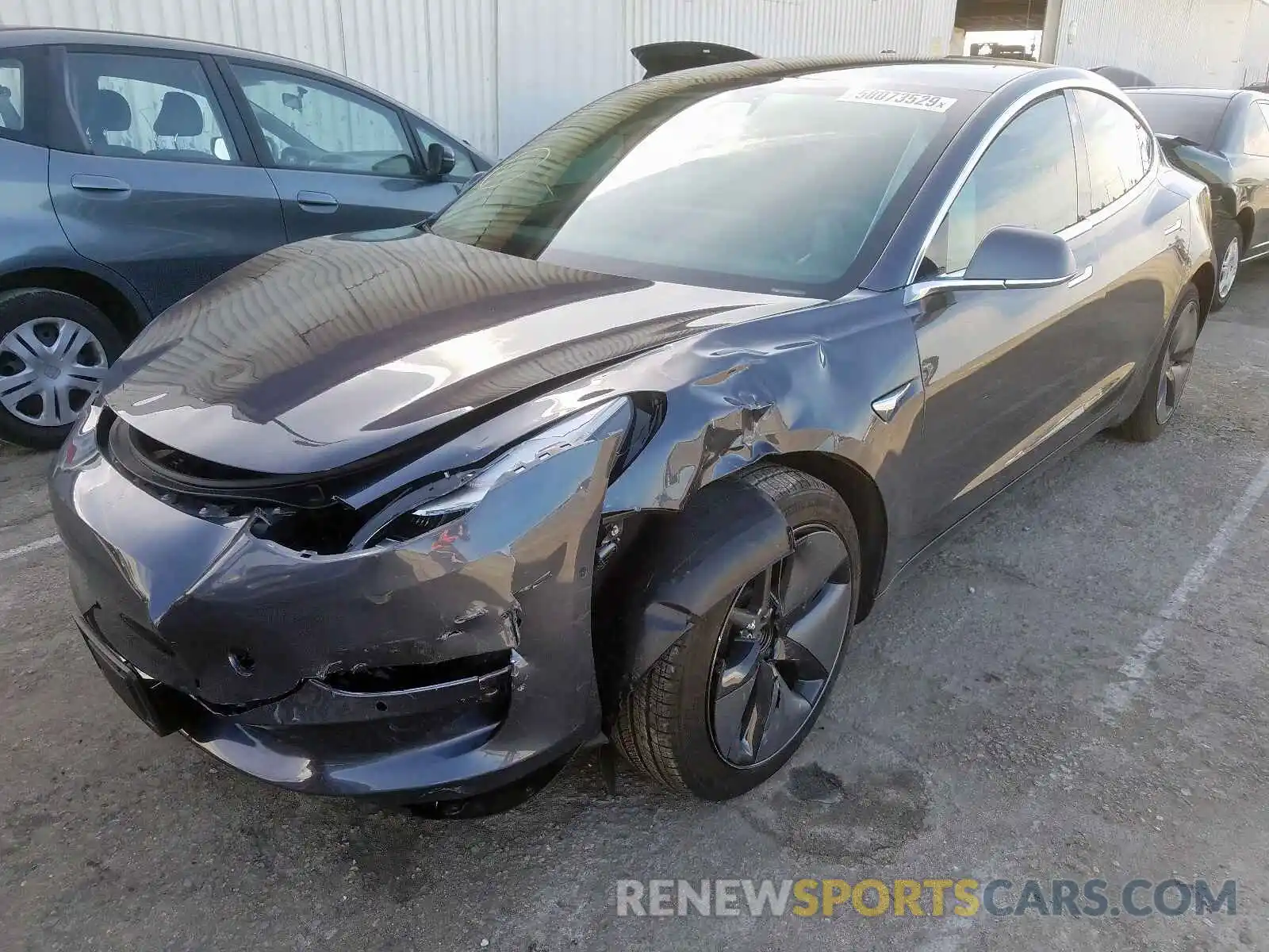 2 Photograph of a damaged car 5YJ3E1EBXKF209720 TESLA MODEL 3 2019