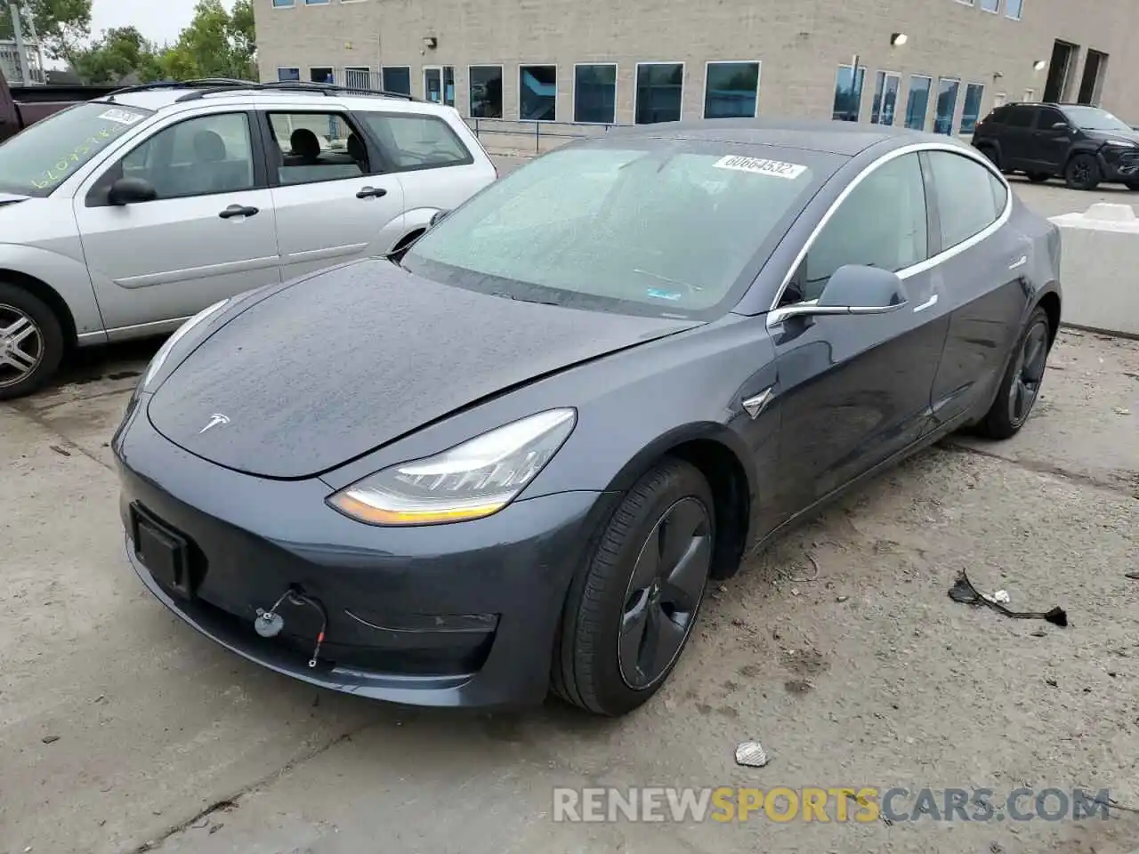 2 Photograph of a damaged car 5YJ3E1EBXKF386946 TESLA MODEL 3 2019