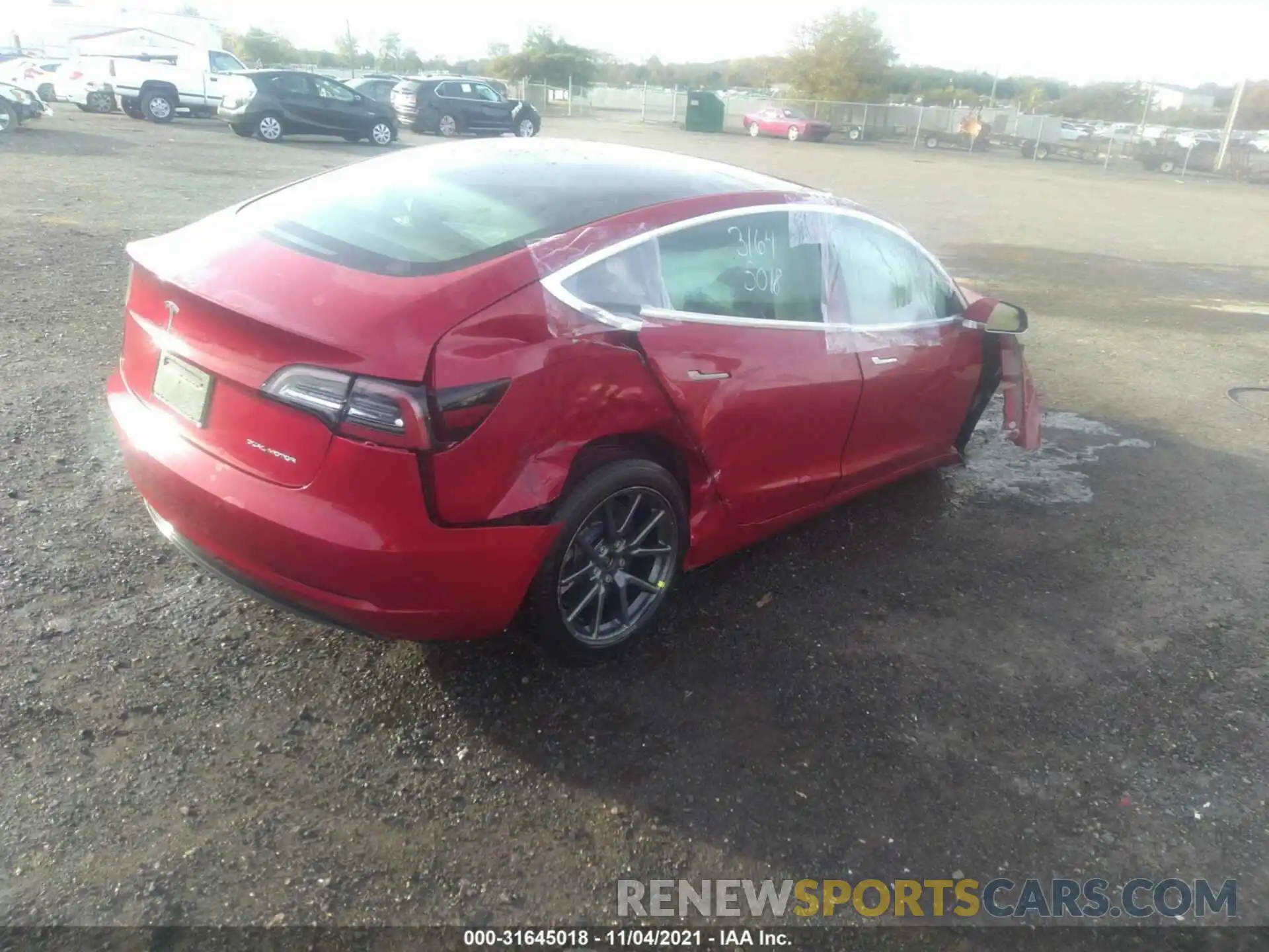 4 Photograph of a damaged car 5YJ3E1EBXKF497125 TESLA MODEL 3 2019