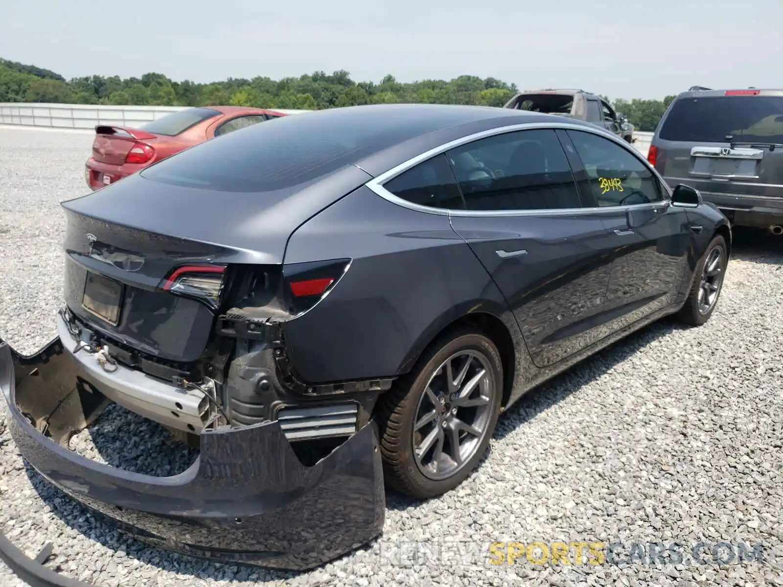 4 Photograph of a damaged car 5YJ3E1EA0LF495523 TESLA MODEL 3 2020