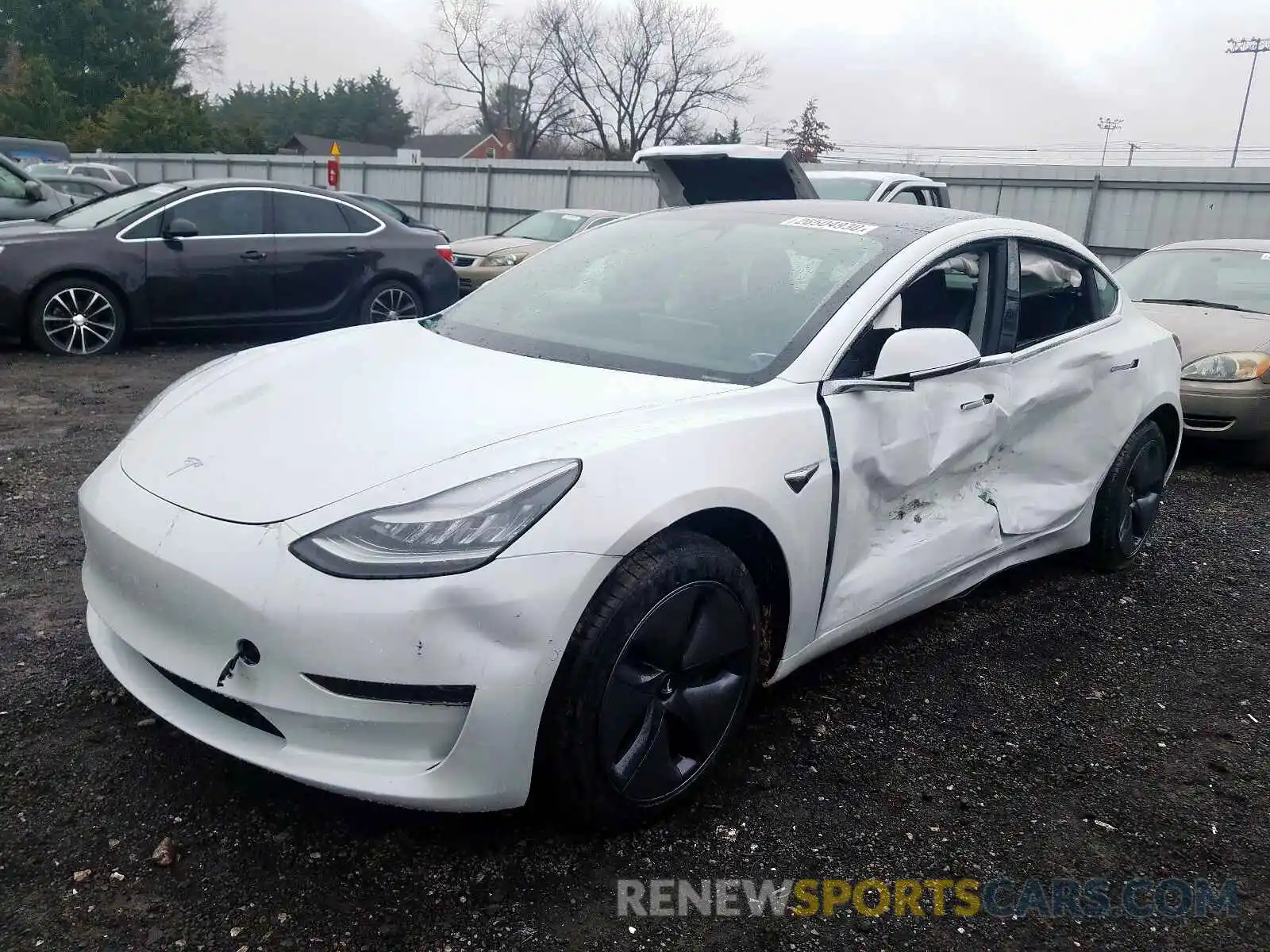 2 Photograph of a damaged car 5YJ3E1EA0LF590714 TESLA MODEL 3 2020