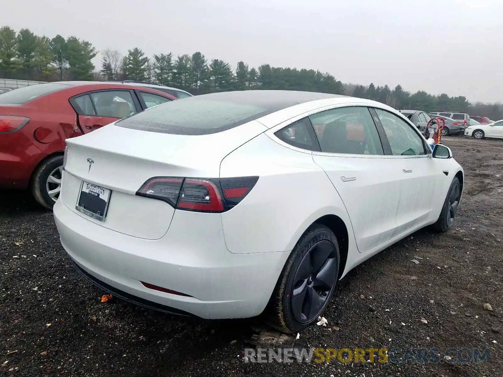 4 Photograph of a damaged car 5YJ3E1EA0LF590714 TESLA MODEL 3 2020