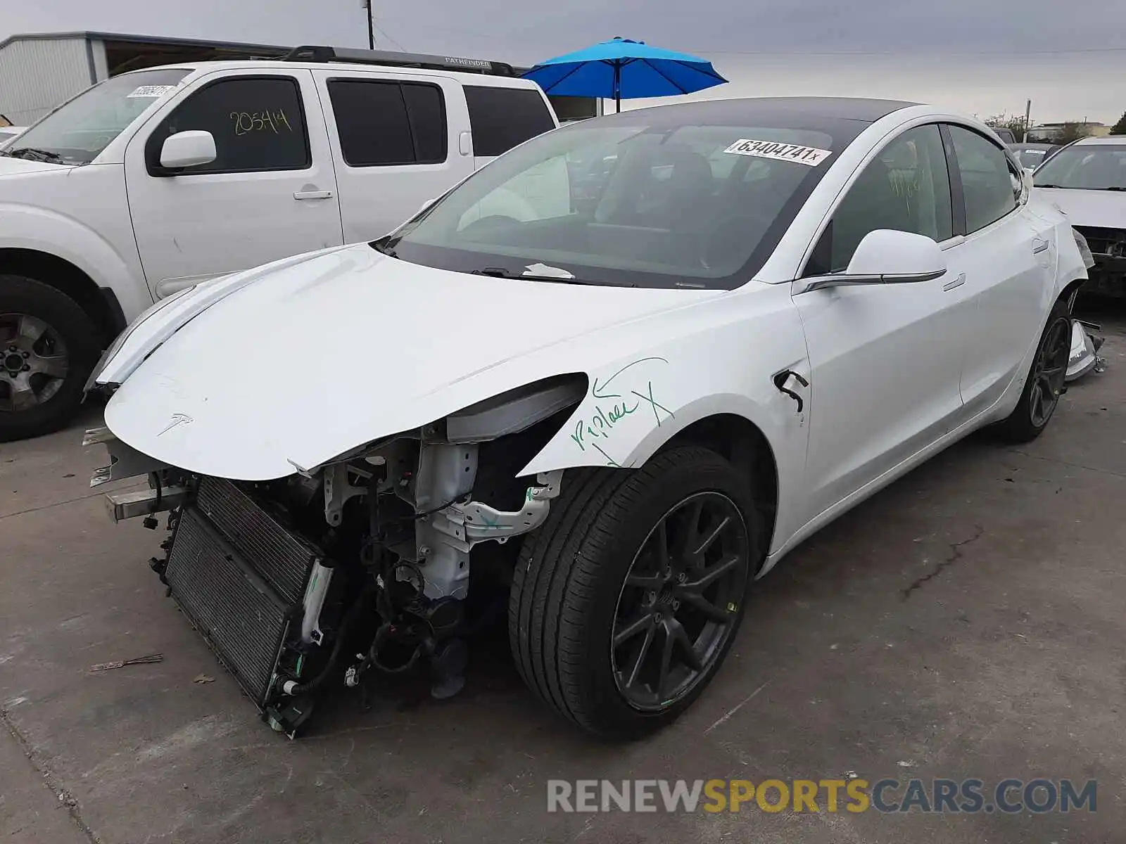 2 Photograph of a damaged car 5YJ3E1EA0LF597646 TESLA MODEL 3 2020