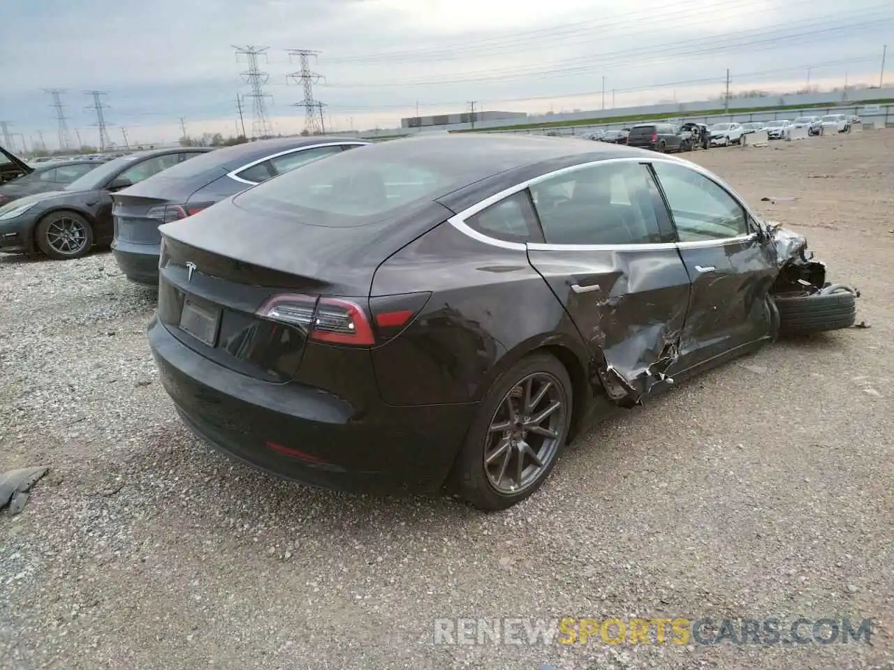 4 Photograph of a damaged car 5YJ3E1EA0LF606443 TESLA MODEL 3 2020