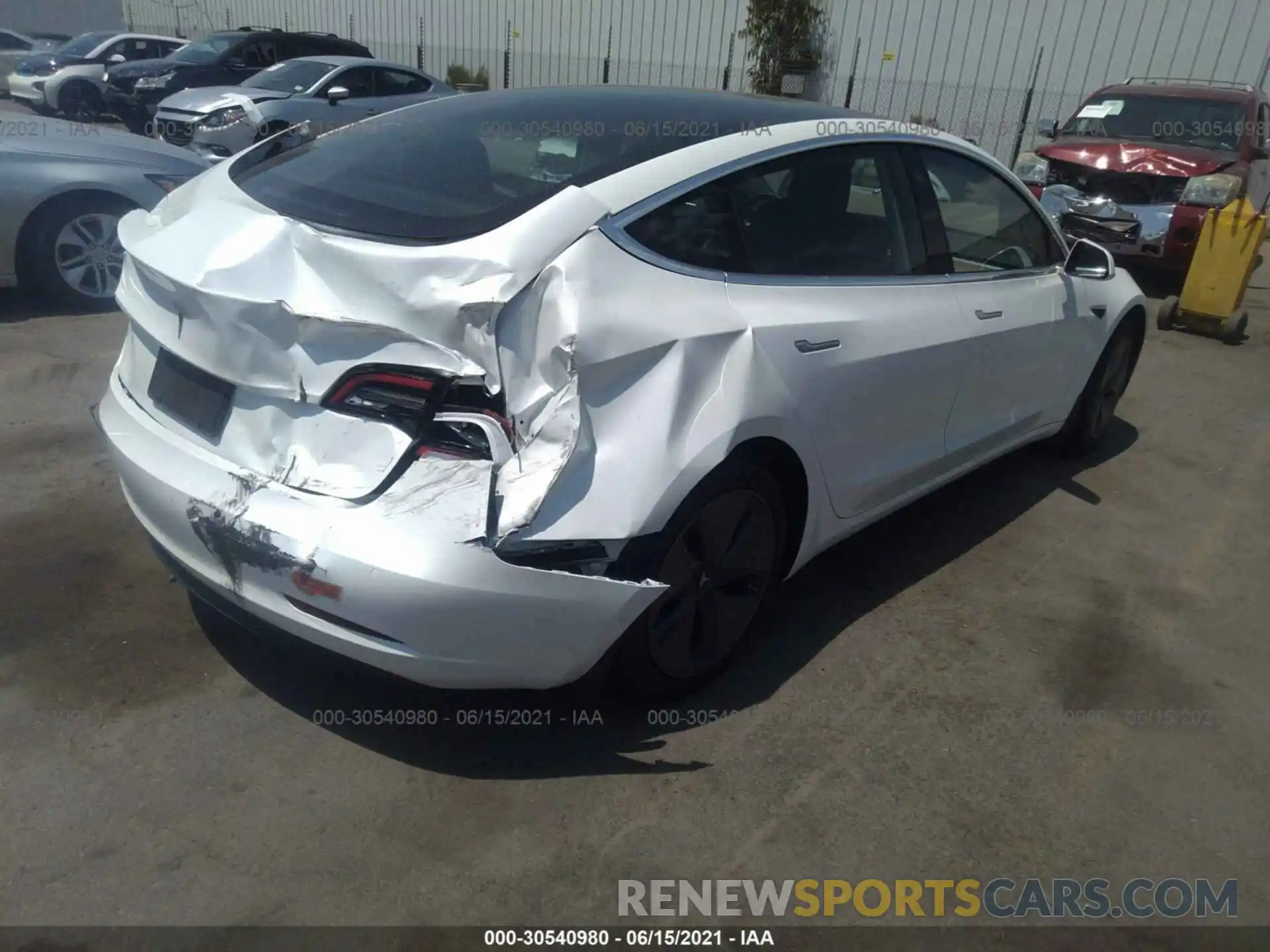 4 Photograph of a damaged car 5YJ3E1EA0LF612341 TESLA MODEL 3 2020