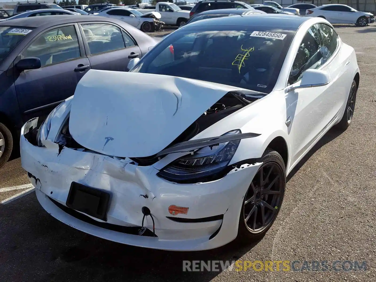 2 Photograph of a damaged car 5YJ3E1EA0LF613795 TESLA MODEL 3 2020