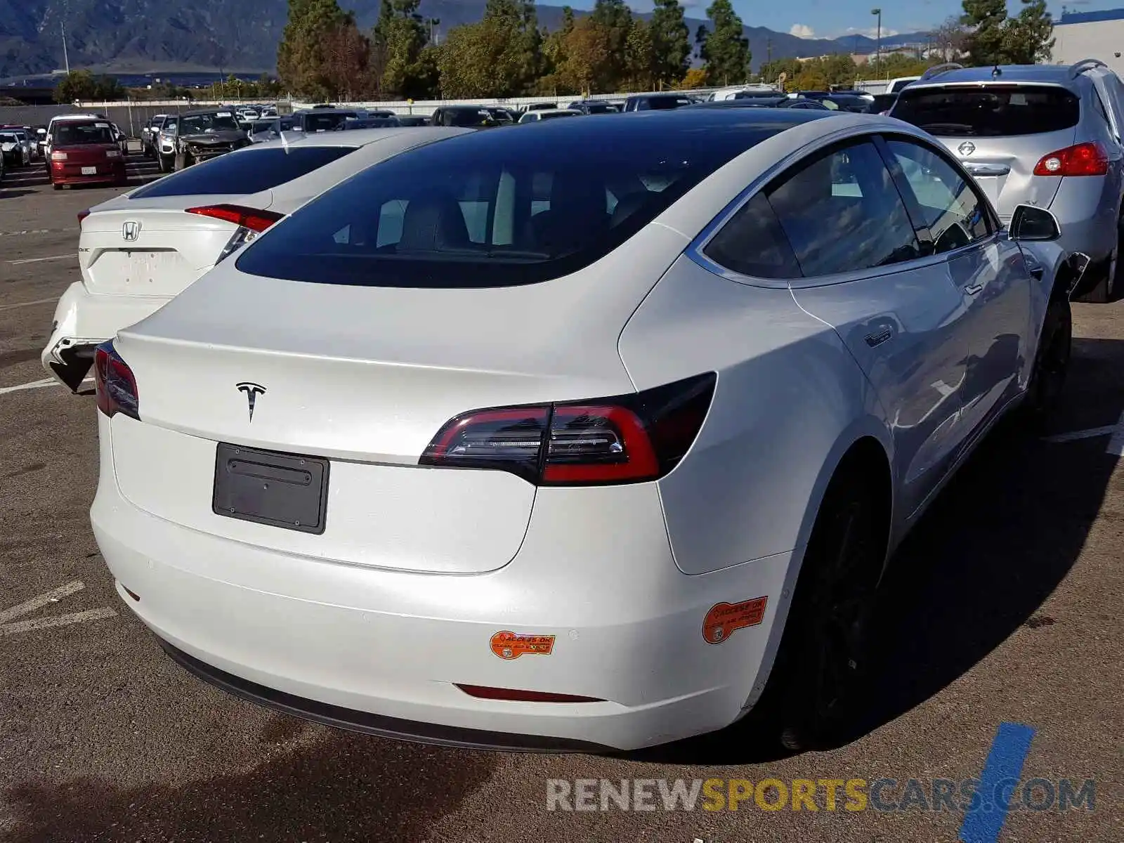 4 Photograph of a damaged car 5YJ3E1EA0LF613795 TESLA MODEL 3 2020