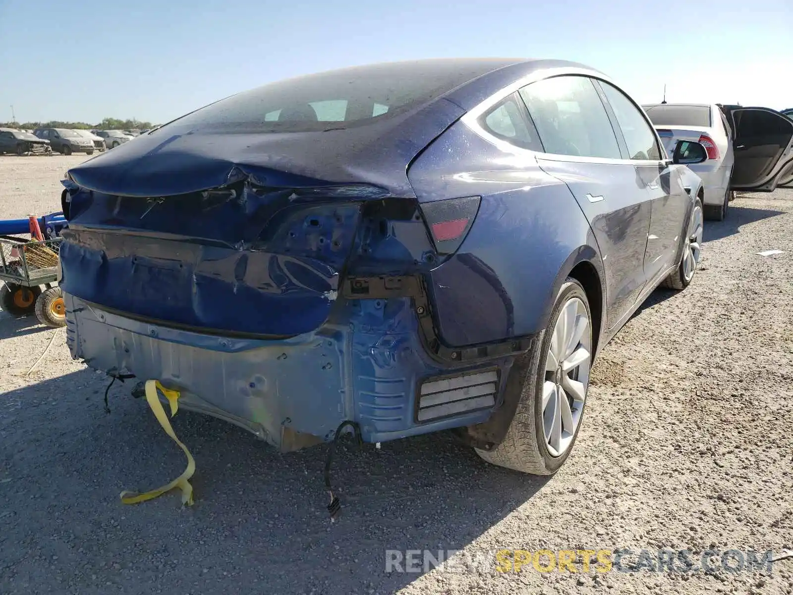 4 Photograph of a damaged car 5YJ3E1EA0LF614185 TESLA MODEL 3 2020